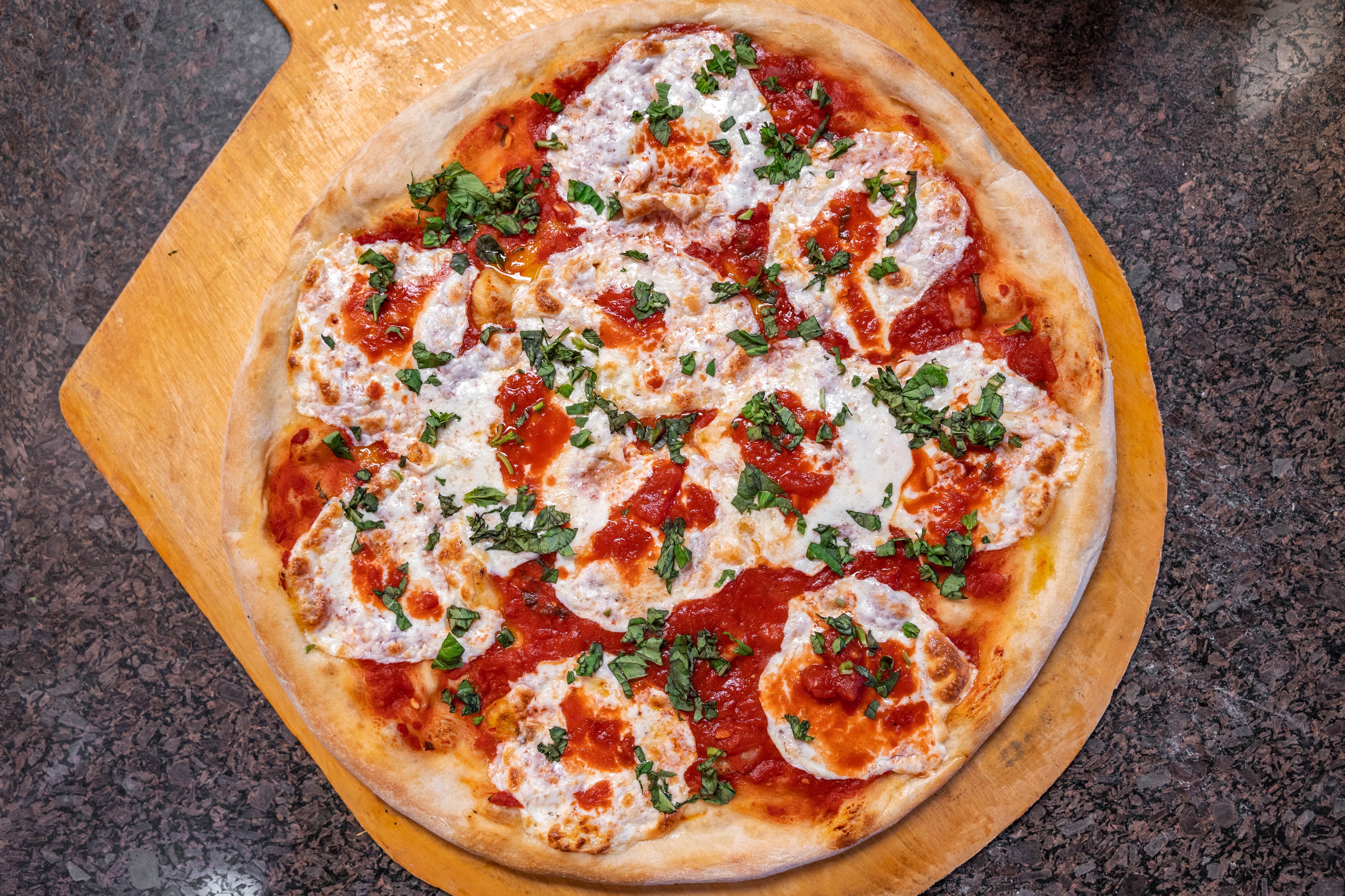 Order Neapolitan Margarita Pizza - Large food online from Father & Sons store, Woodbury on bringmethat.com