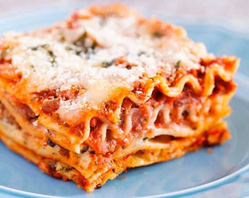 Order Lasagna - Pasta food online from Luigi's Italian Restaurant store, Bartlesville on bringmethat.com