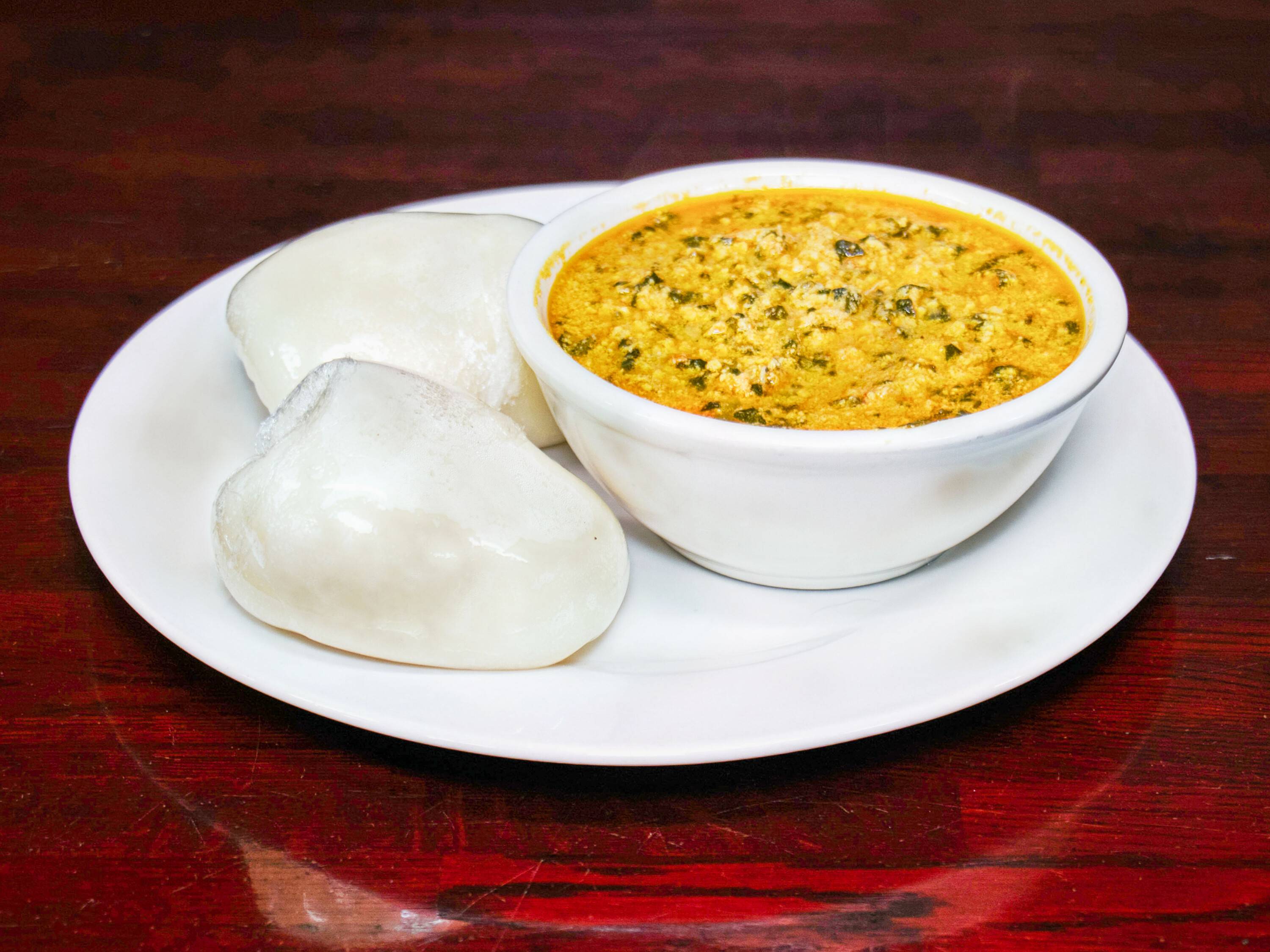 Order Egusi Soup with Mixed Meat food online from De Ranch Restaurant store, Hyattsville on bringmethat.com