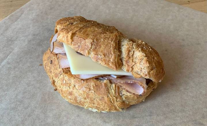 Order Turkey and Cheese on Multigrain Croissant food online from Caffe Nero store, Winchester on bringmethat.com