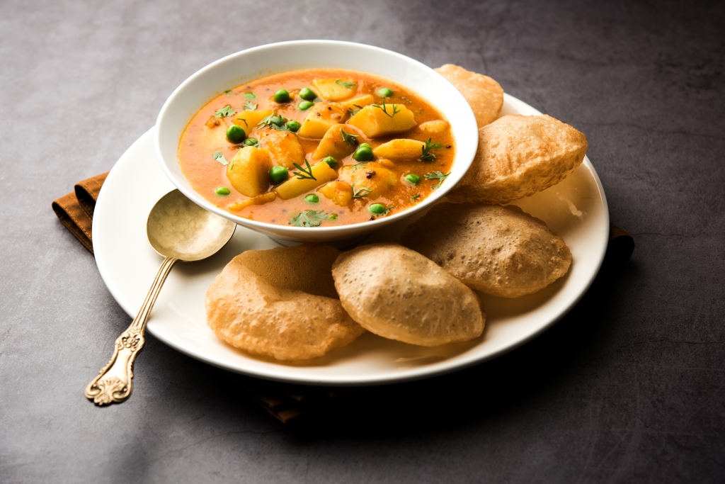 Order Puri Curry (2Pcs) food online from House Of Biryanis store, Sunnyvale on bringmethat.com