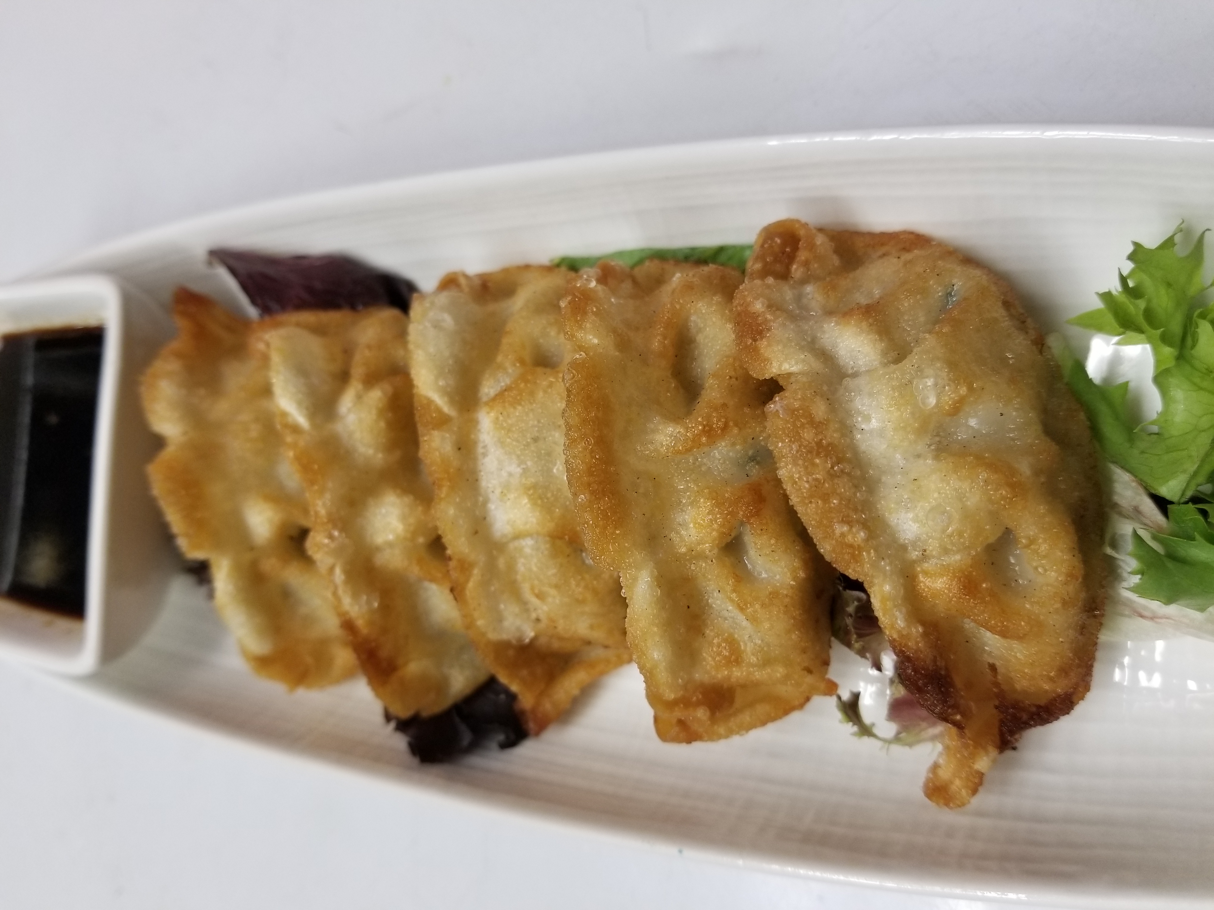Order Gyoza food online from Agami Contemporary Sushi store, Chicago on bringmethat.com