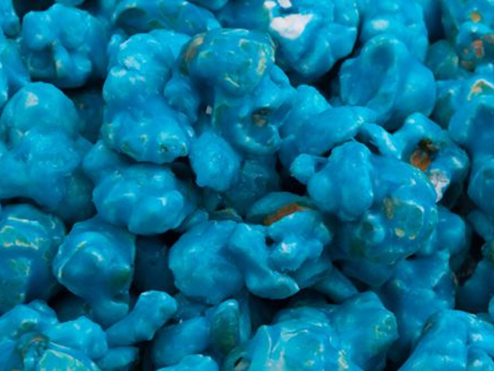 Order BLUE COCONUT food online from Poparazzis Popcorn store, Houston on bringmethat.com