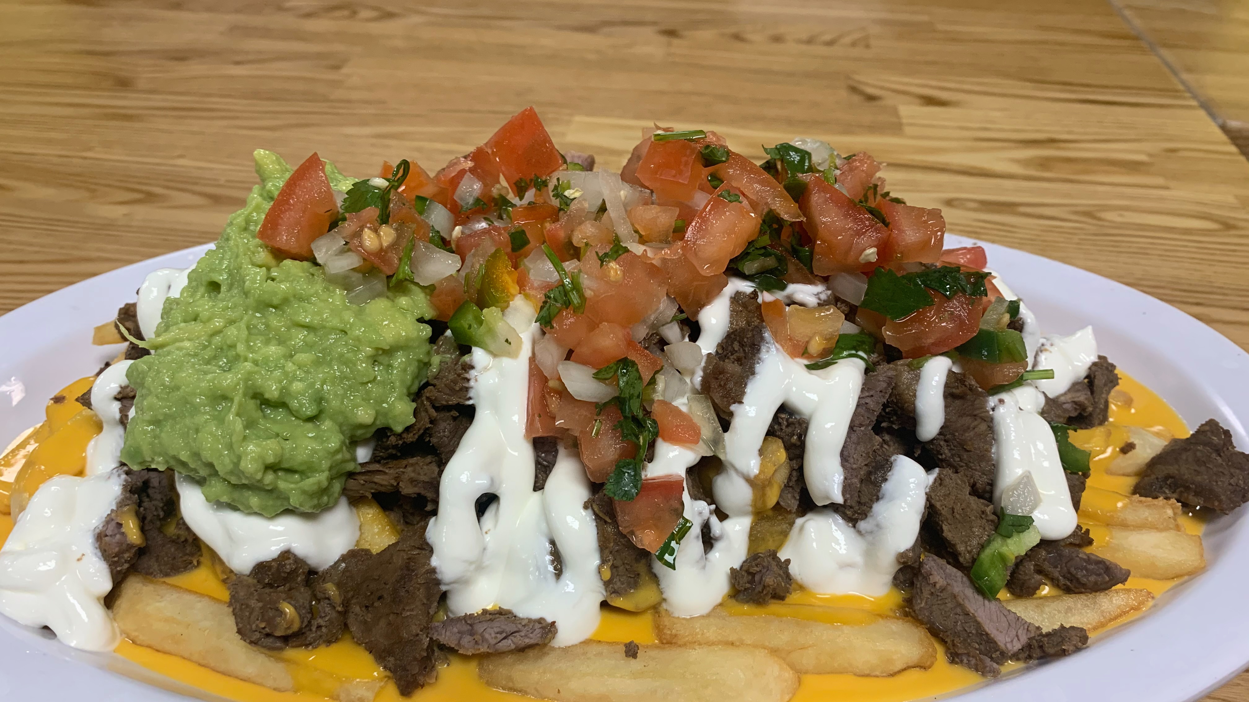 Order Carne Asada fries food online from Durango Taco Shop #4 store, Las Vegas on bringmethat.com