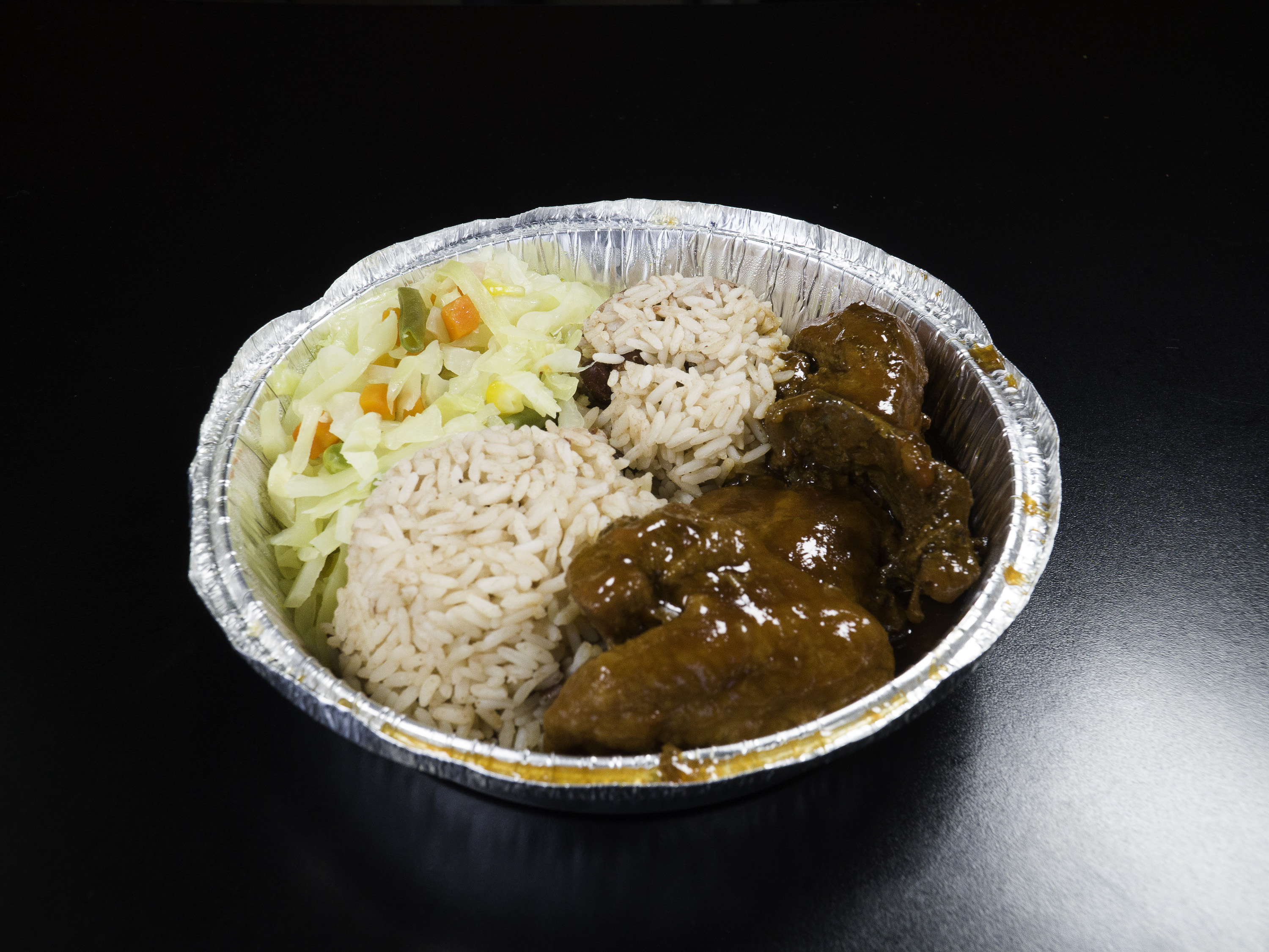 Order Small Brown Stew Chicken food online from Tropicana Eatery store, Silver Spring on bringmethat.com