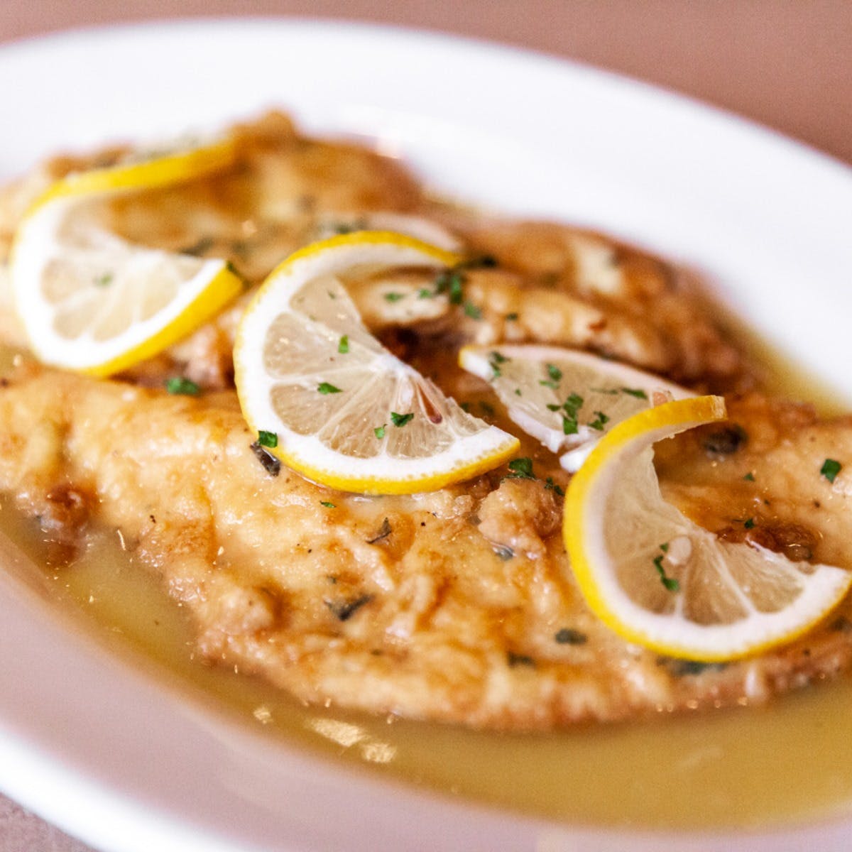 Order Chicken Francese - Entree food online from Planet Pizza store, Shelton on bringmethat.com