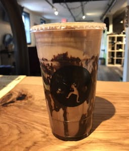 Order Chocolate Hazelnut Iced Latte food online from Wicked Loft store, Whitman on bringmethat.com
