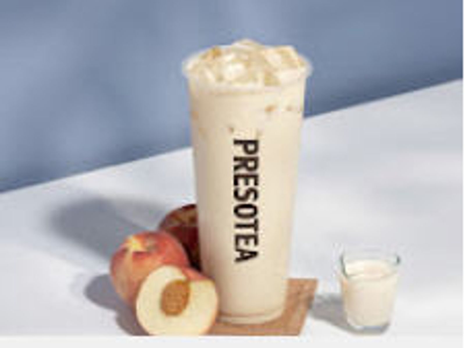 Order White Peach Milk Tea food online from Presotea Aurora Co store, Aurora on bringmethat.com