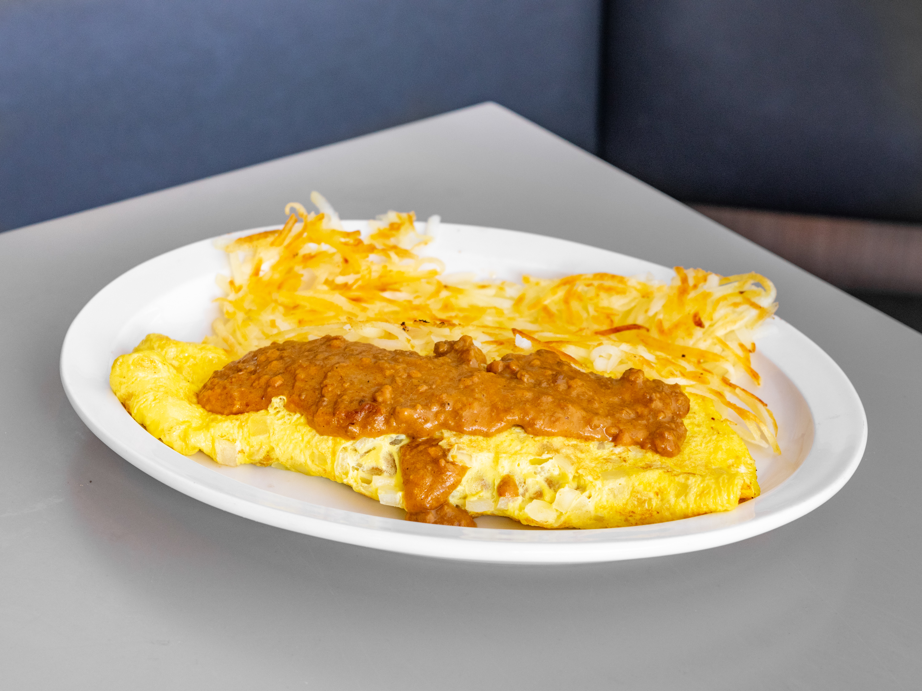 Order Chili and Cheese Omelette food online from Leo Coney Island On Tap (122 Oakes St Sw store, Grand Rapids on bringmethat.com