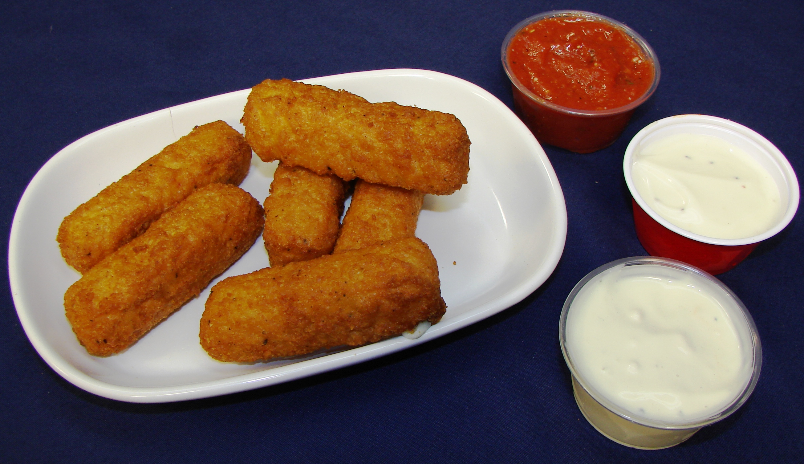 Order Mozzarella Cheese Sticks food online from Calz Pizza Subs & Chicken Wings store, Virginia Beach on bringmethat.com
