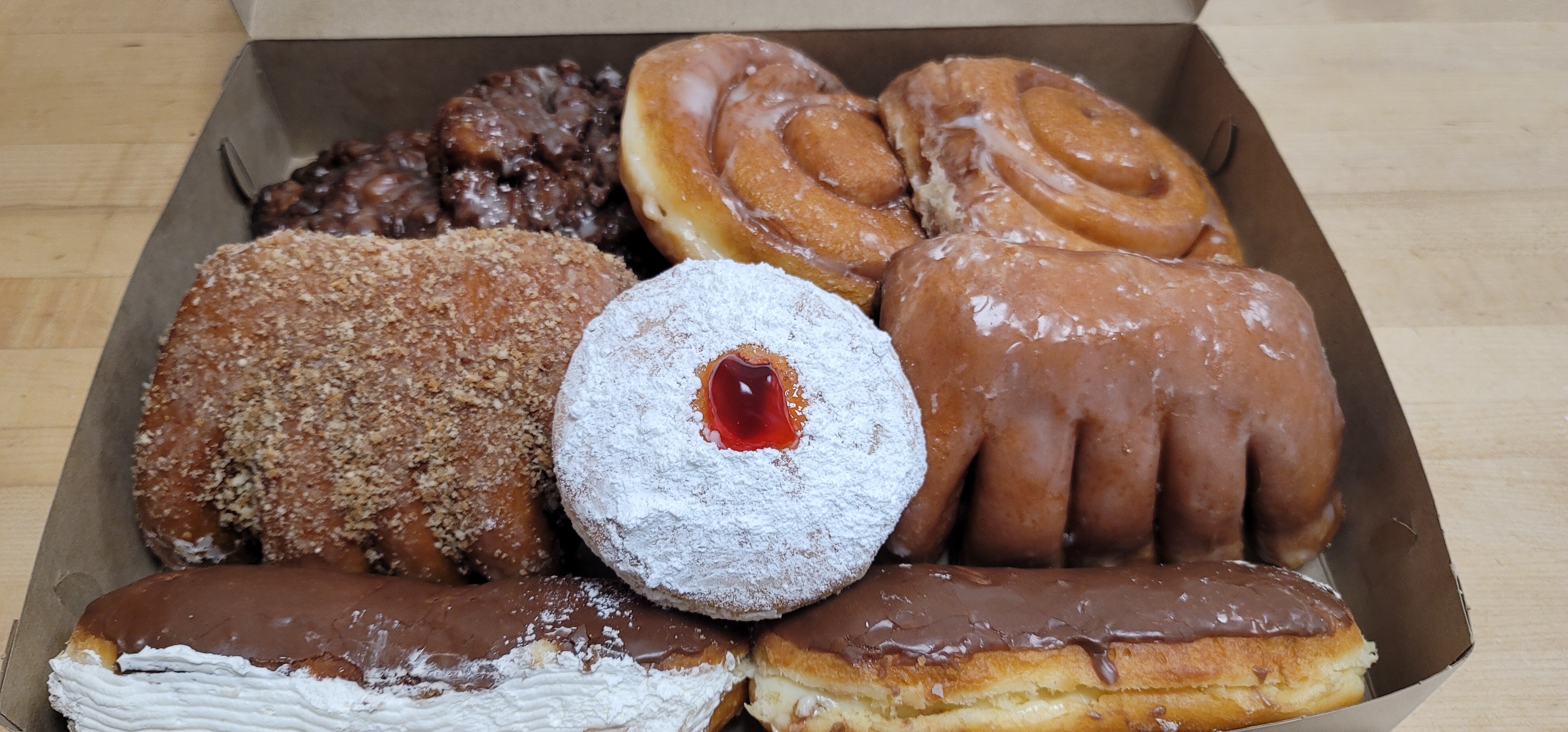 Order Large Dozen food online from Golden Donuts store, National City on bringmethat.com