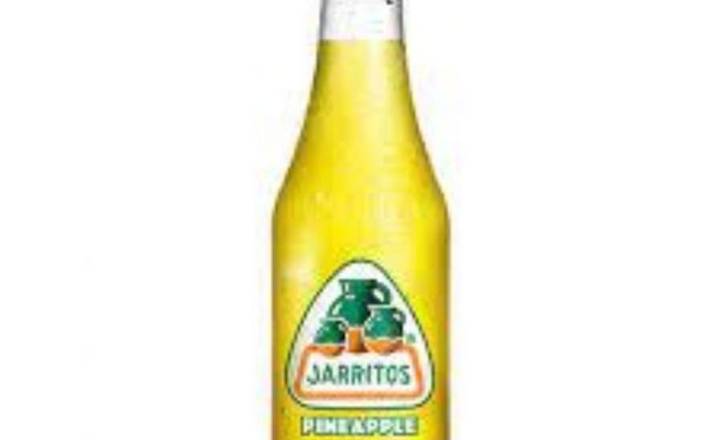 Order Jarritos Pineapple (12OZ) food online from Alpaca Peruvian Charcoal Chicken store, Knightdale on bringmethat.com
