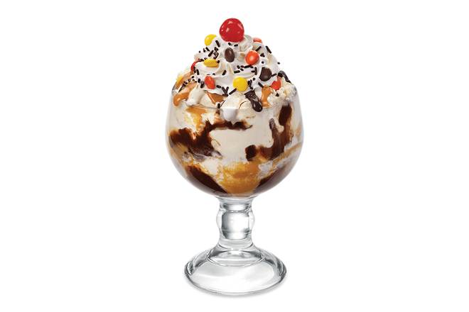 Order Reese's® Pieces® Sundae food online from Friendly's store, Deptford on bringmethat.com