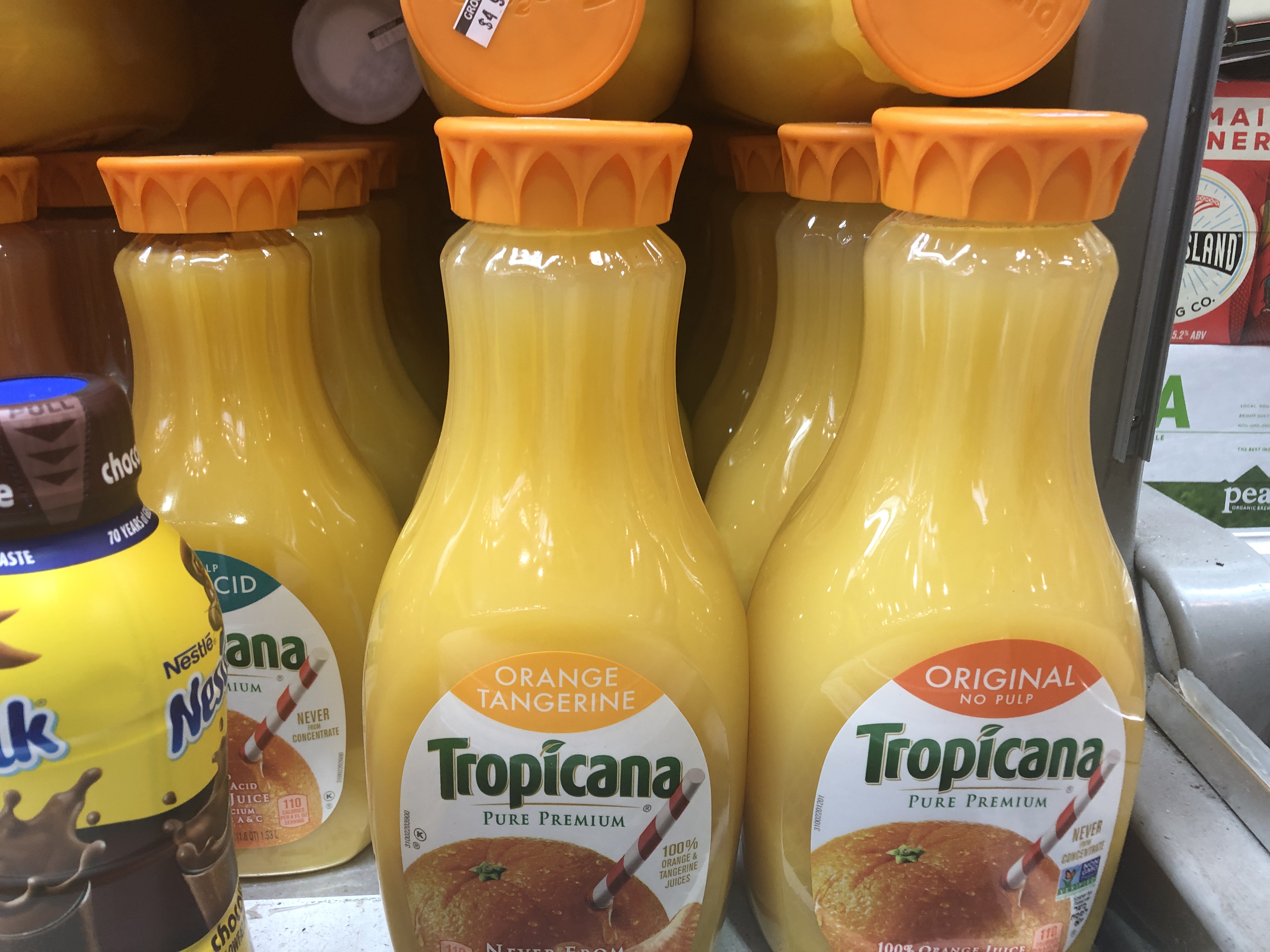 Order 59 oz. Tropicana Juice food online from 5 brothers gourmet deli store, New York on bringmethat.com