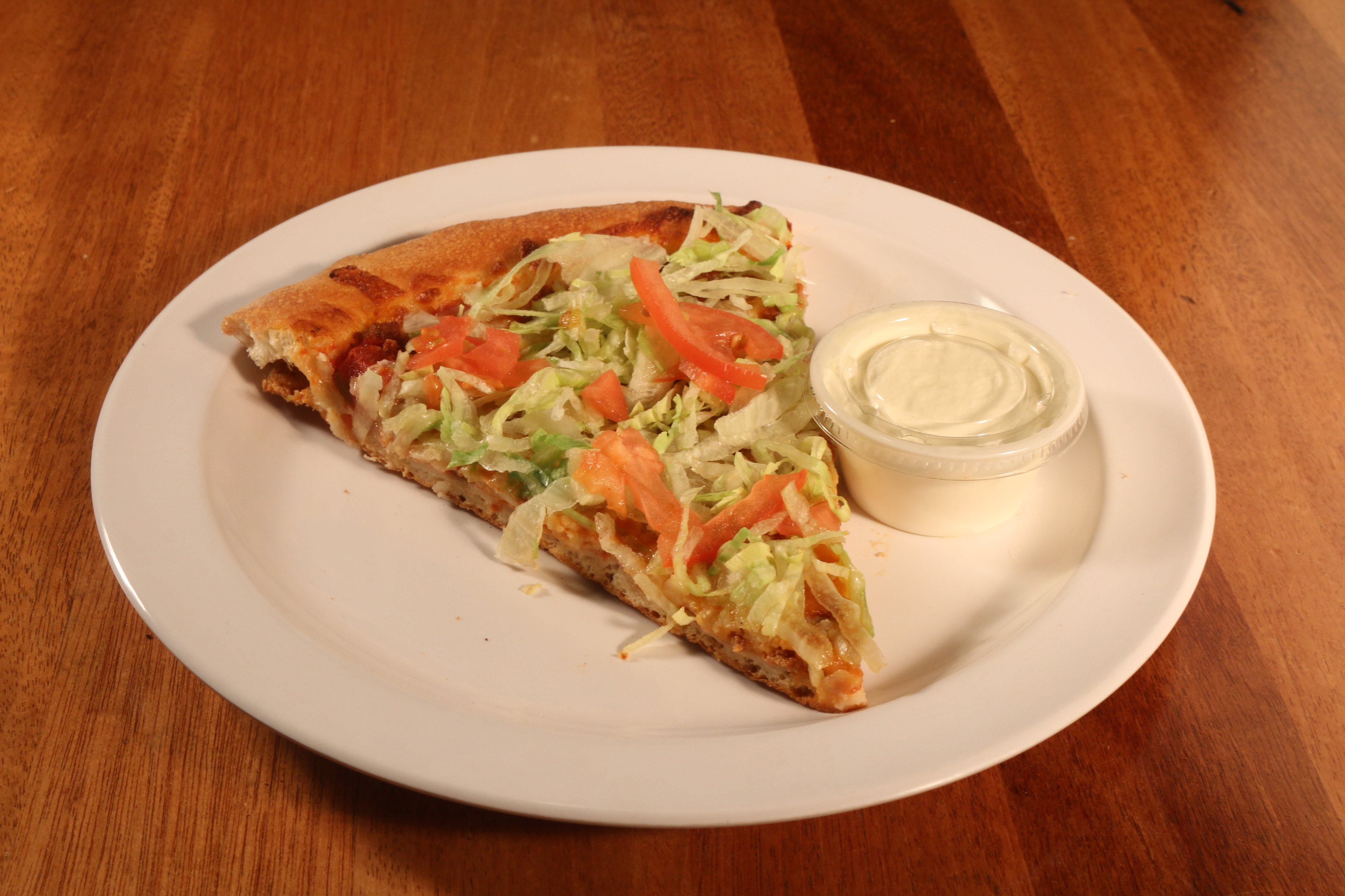 Order Taco Pizza Slice food online from UnCommon Pizza store, Lititz on bringmethat.com