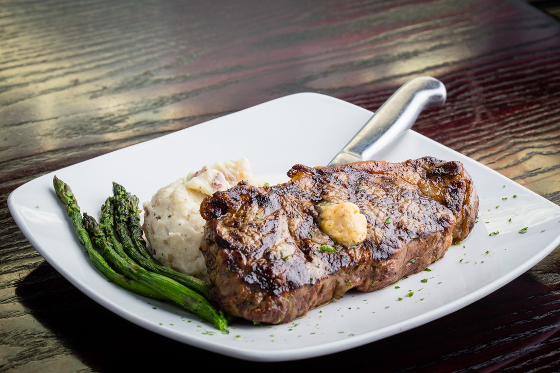 Order Hand Cut New York Strip food online from Sedona Taphouse store, Colonial Heights on bringmethat.com