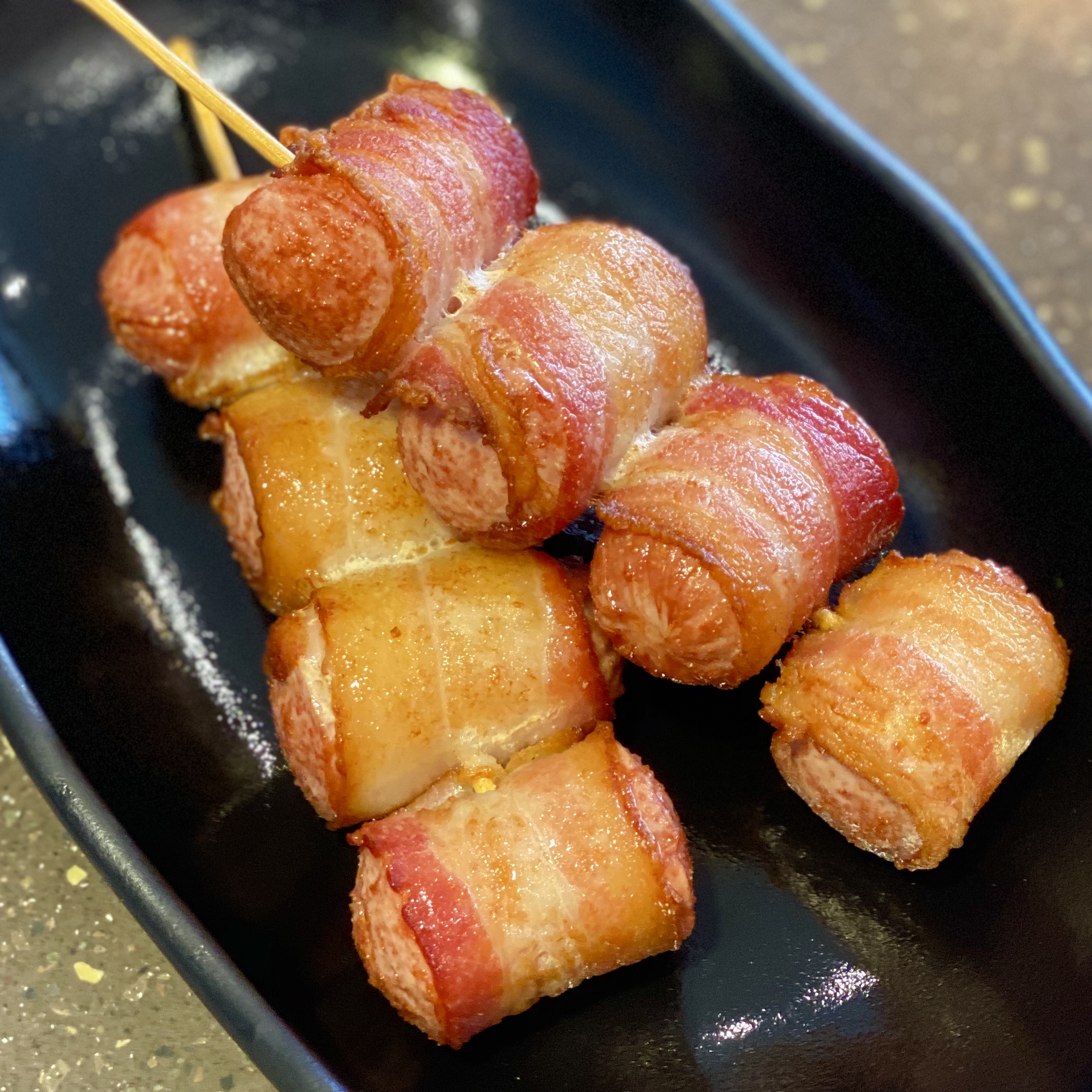 Order Bacon wrapped sausage 煙肉腸仔卷 food online from Sugar & Water store, San Francisco on bringmethat.com