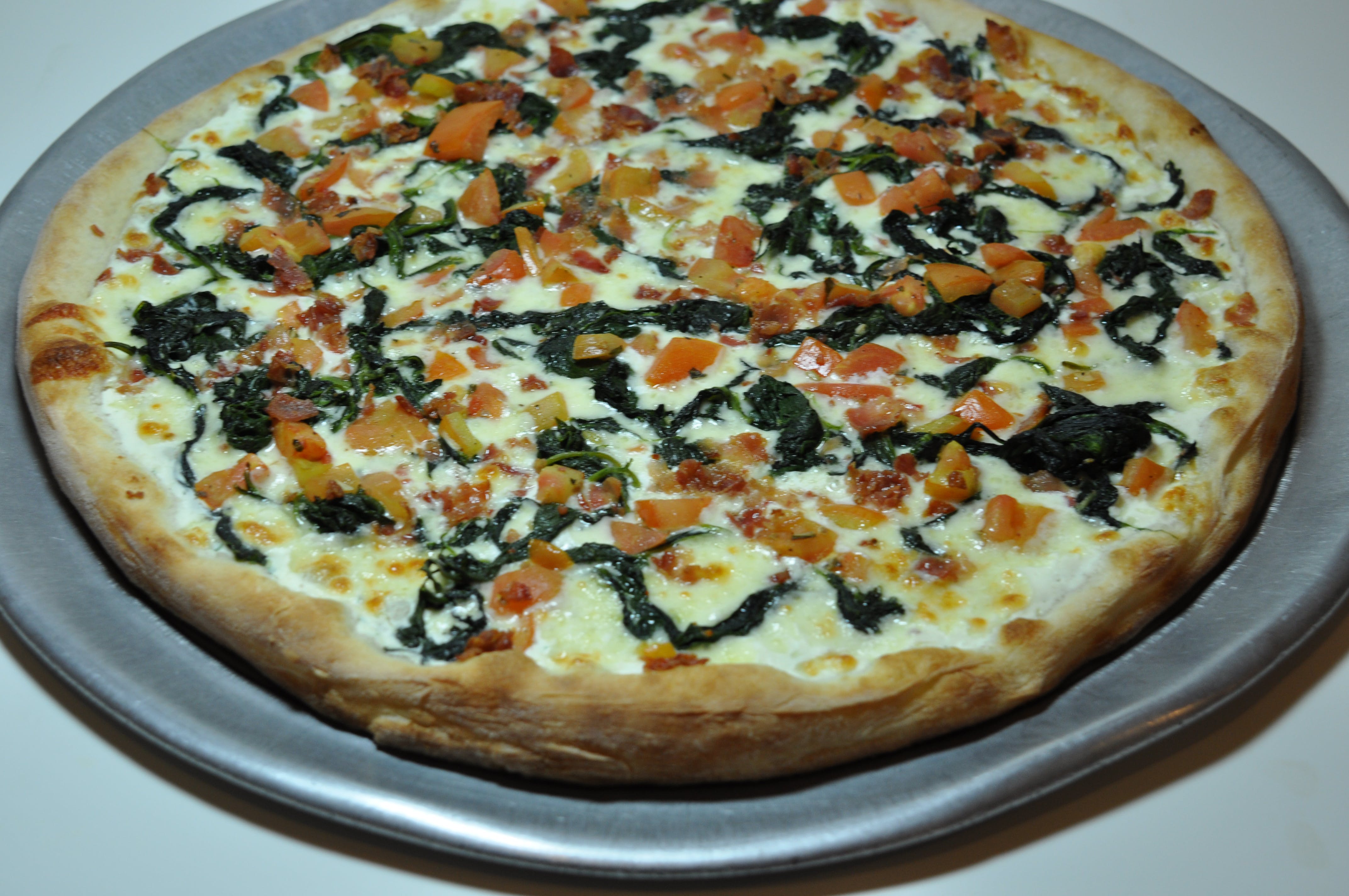 Order Spinach & Bacon Deluxe Pizza - Personal food online from Giacomo's Pizza store, Poughkeepsie on bringmethat.com