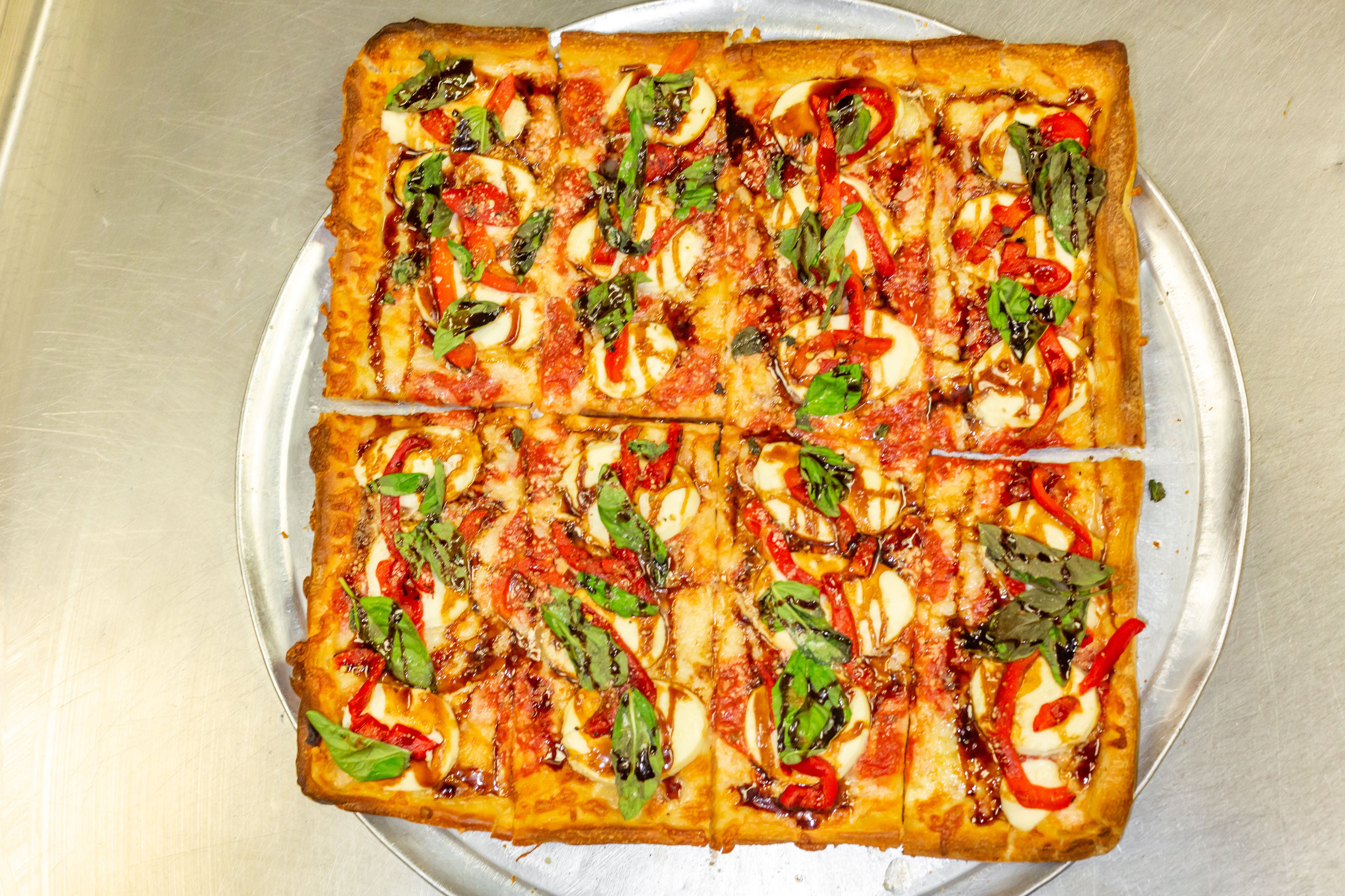 Order Mona Liza Pizza - Sicilian (12 Slices) food online from Amalfi Pizza store, Newark on bringmethat.com