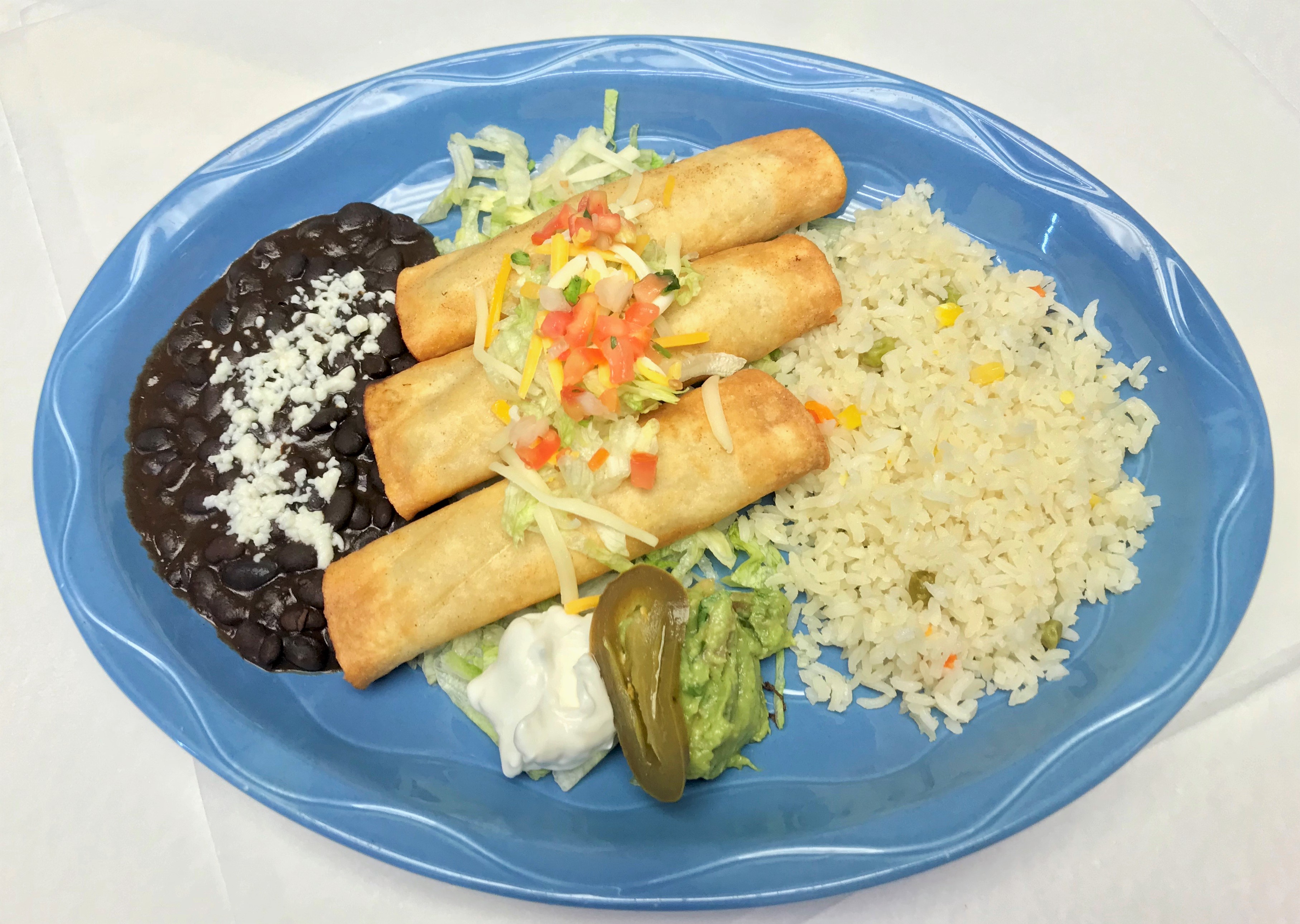 Order Taquitos Con Papas food online from Guadalajara Mexican Grill store, Tucson on bringmethat.com
