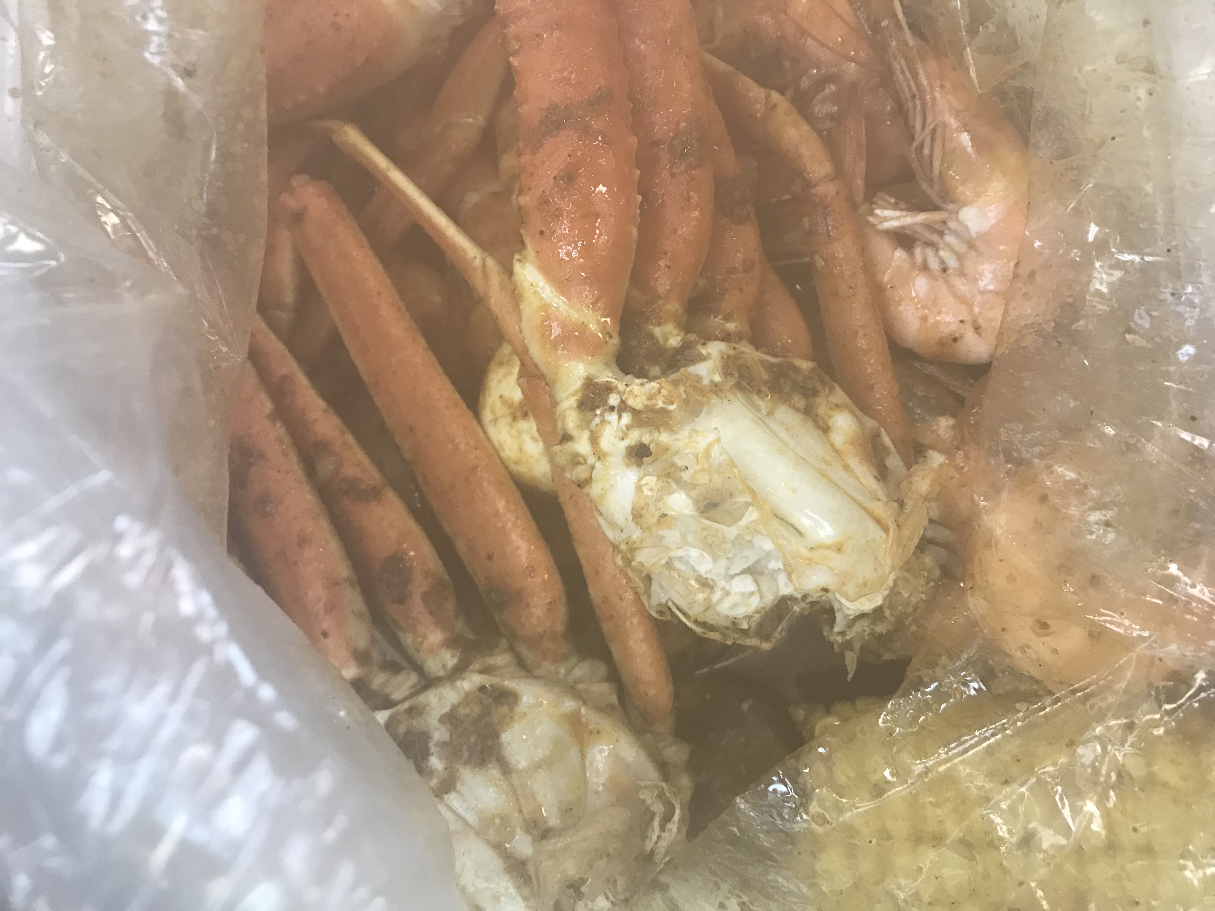 Order D. 1lb. snow crab and 1lb. Shrimp (Head on) combo food online from Tasty Crab store, Fayetteville on bringmethat.com