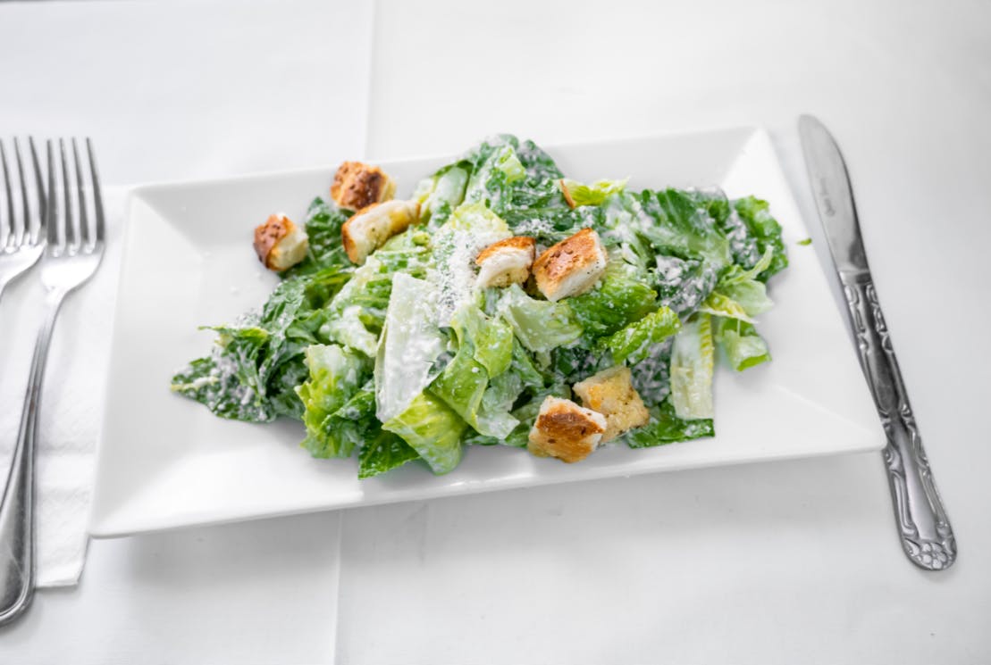 Order Caesar Salad - Salad food online from Alessios Seafood Grille store, Warrington on bringmethat.com