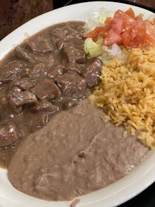 Order 26. Guisada Plate food online from Mi Rancho store, San Antonio on bringmethat.com