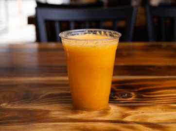Order Orange Juice (16oz) food online from Cafe Guatemalteco store, San Francisco on bringmethat.com