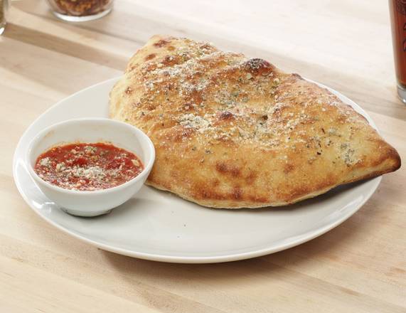 Order Johnny’s Meat Deluxe Calzone food online from Johnny's New York Style Pizza store, Cumming on bringmethat.com