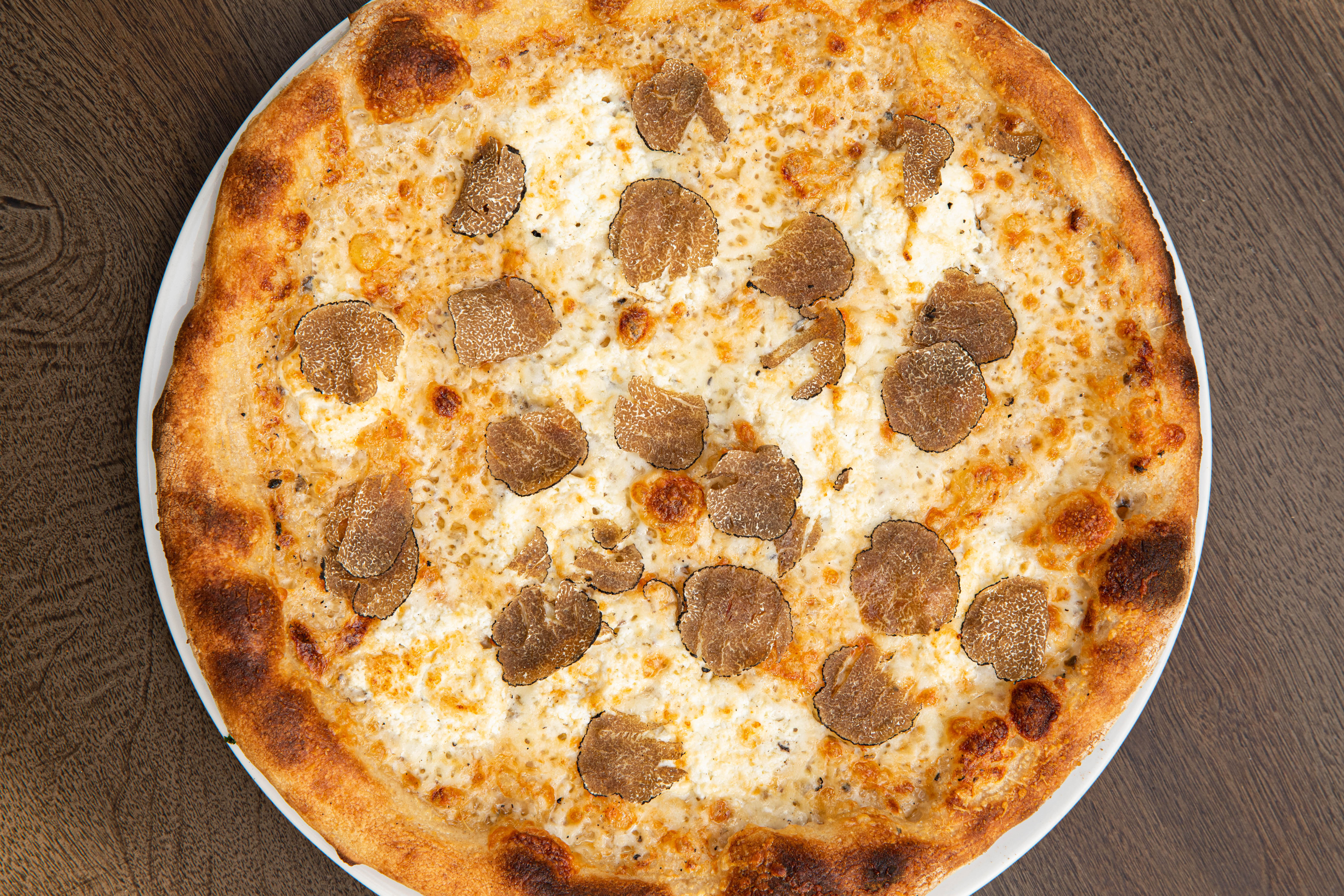 Order Black Truffle & Three Cheese food online from Pizzeria Portofino store, Chicago on bringmethat.com