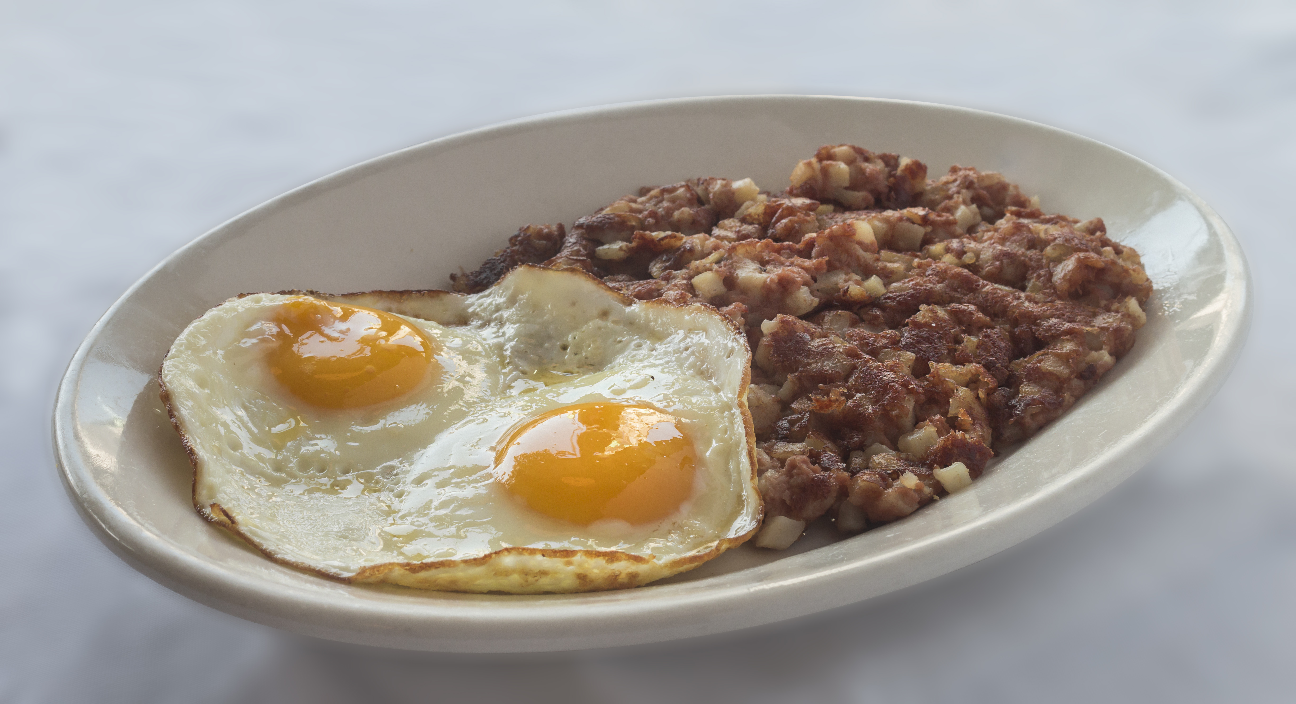Order Corned Beef Hash and Eggs food online from Golden Apple Restaurant store, Chicago on bringmethat.com