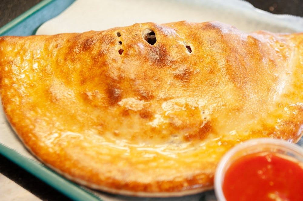 Order Calzone - Calzone food online from Cafe Gia store, Medford on bringmethat.com