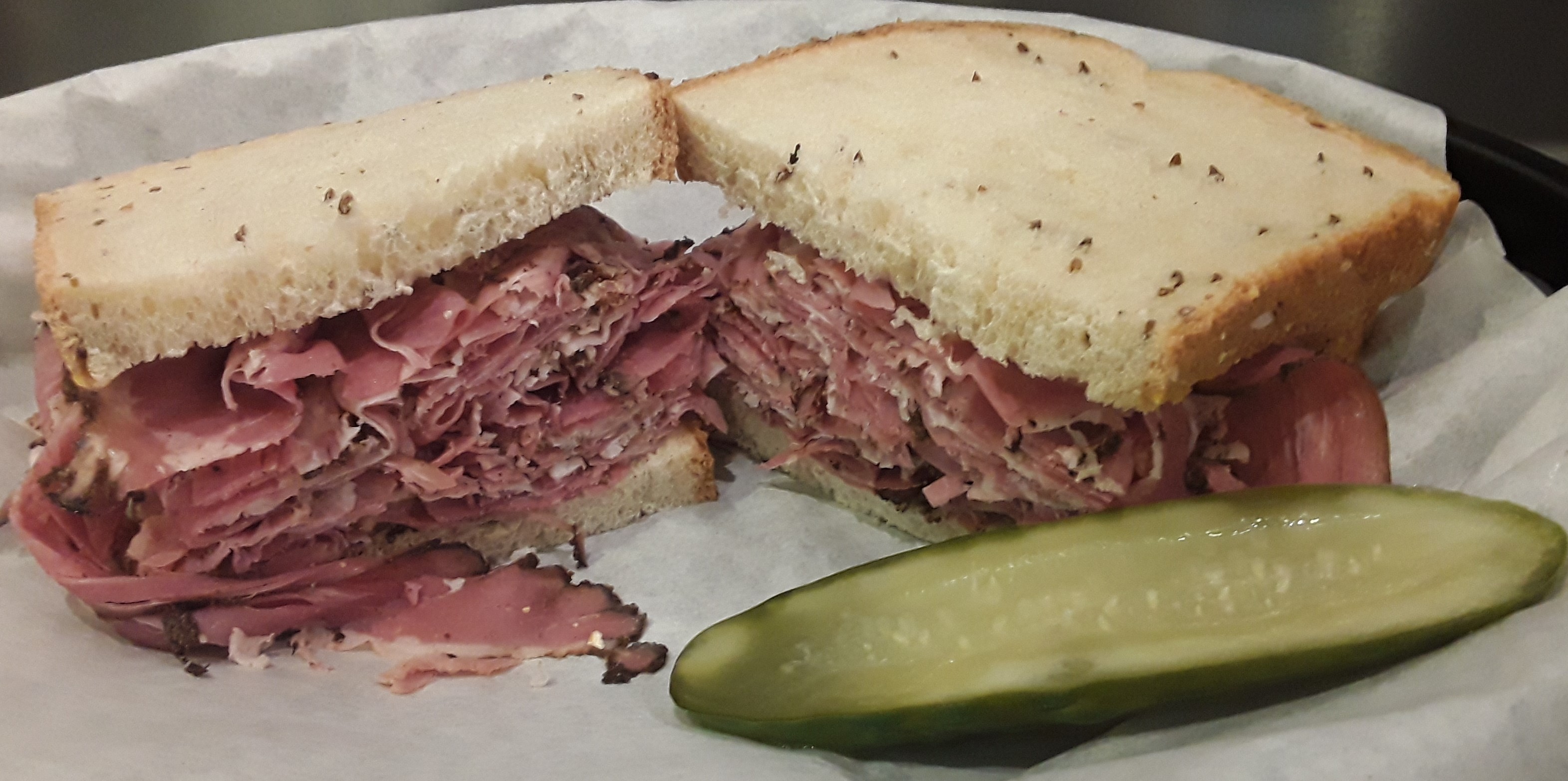 Order Regular Pastrami Sandwich food online from Mo Deli store, Anchorage on bringmethat.com