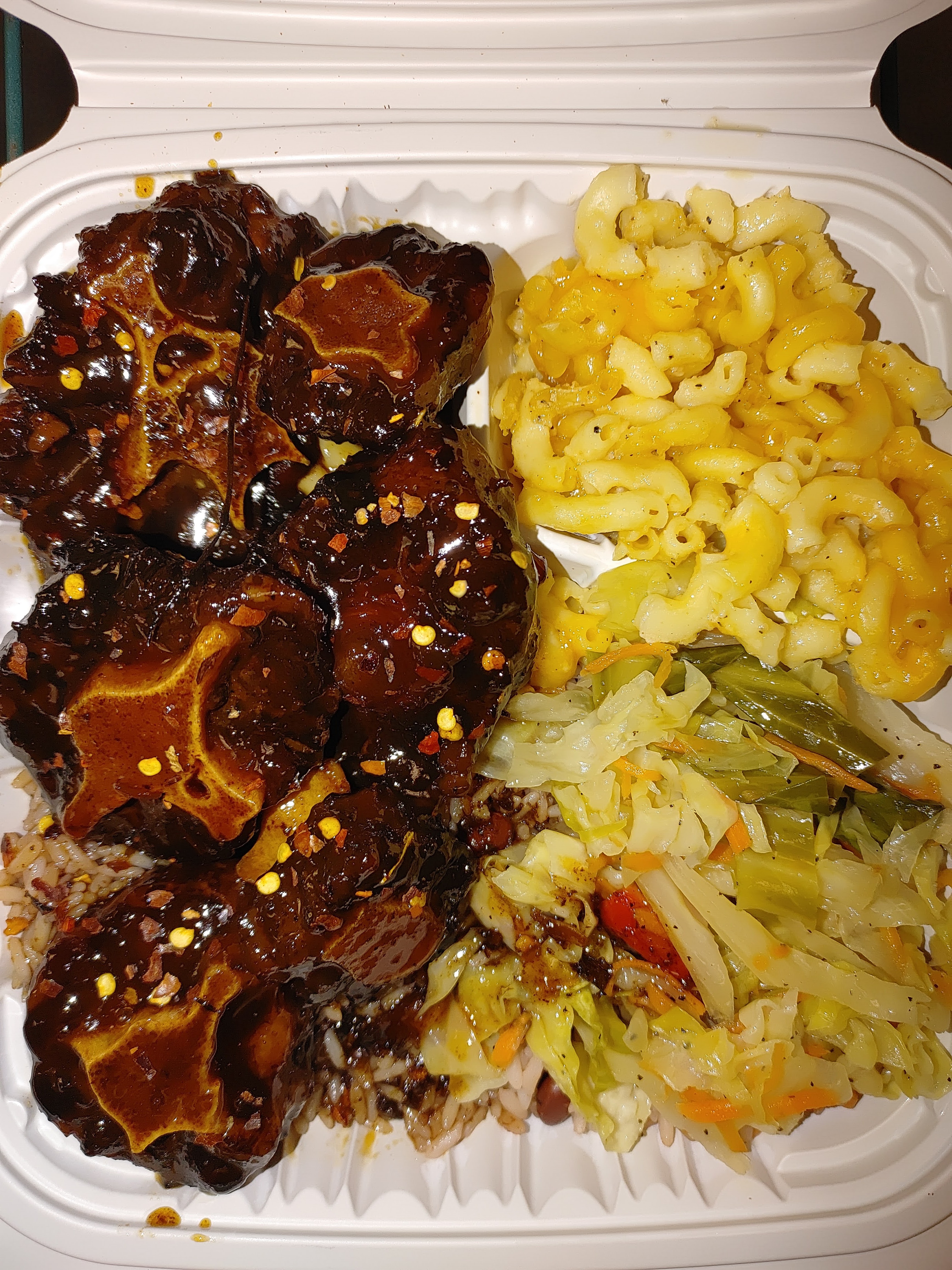 Order Caramelized Oxtails food online from Nelz Jamaican Food And Wings store, York on bringmethat.com