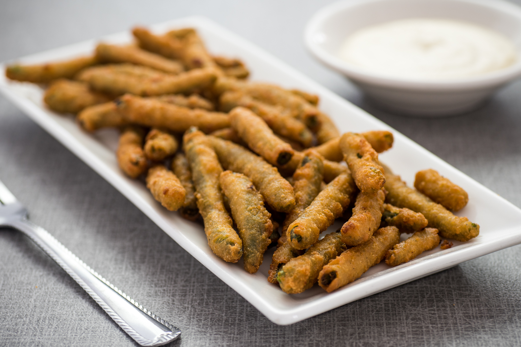 Order Fried Green Beans food online from Flavors Around The Sqaure store, Painesville on bringmethat.com