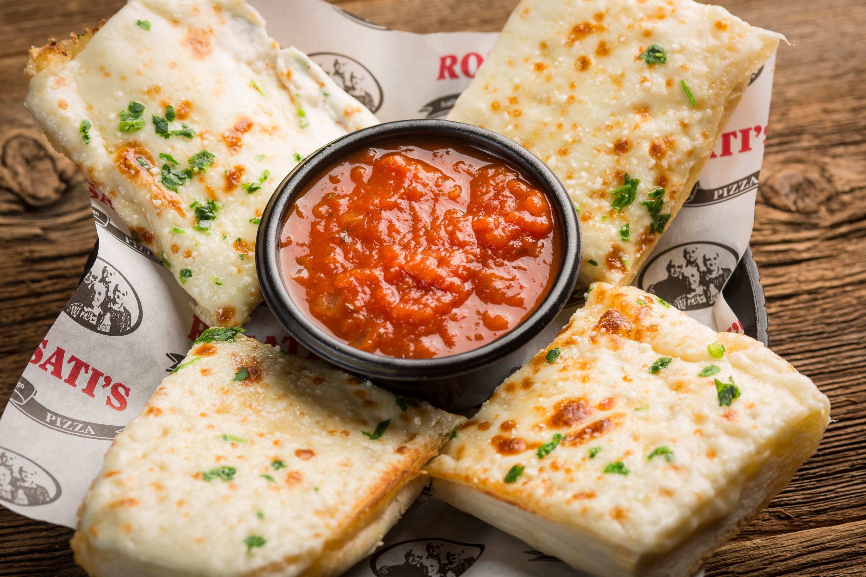 Order Garlic Cheese Bread with Red Sauce food online from Rosati's Pizza store, Shorewood on bringmethat.com
