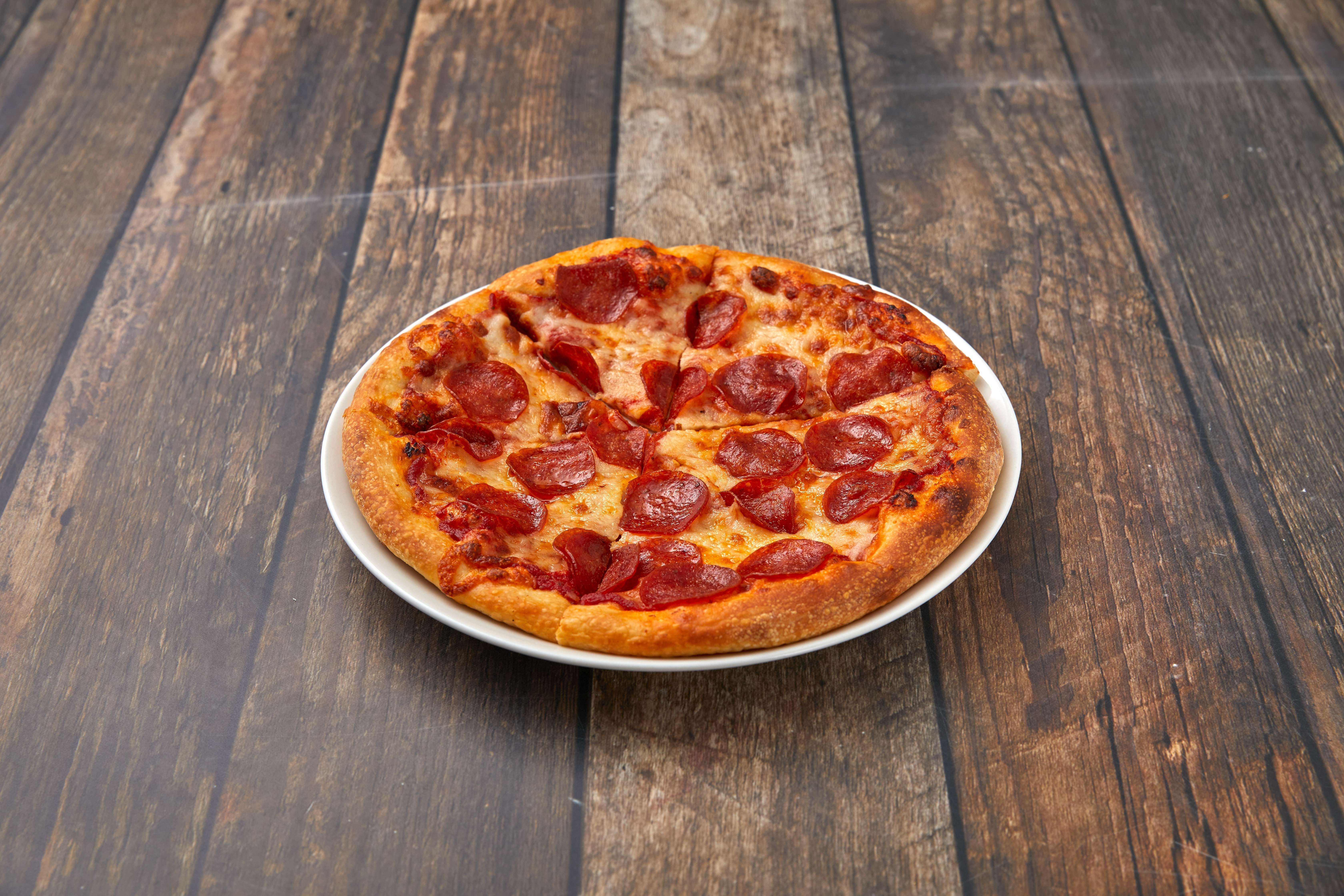 Order 1 Topping Pizza food online from Dominic Italian Restaurant store, Oceanside on bringmethat.com