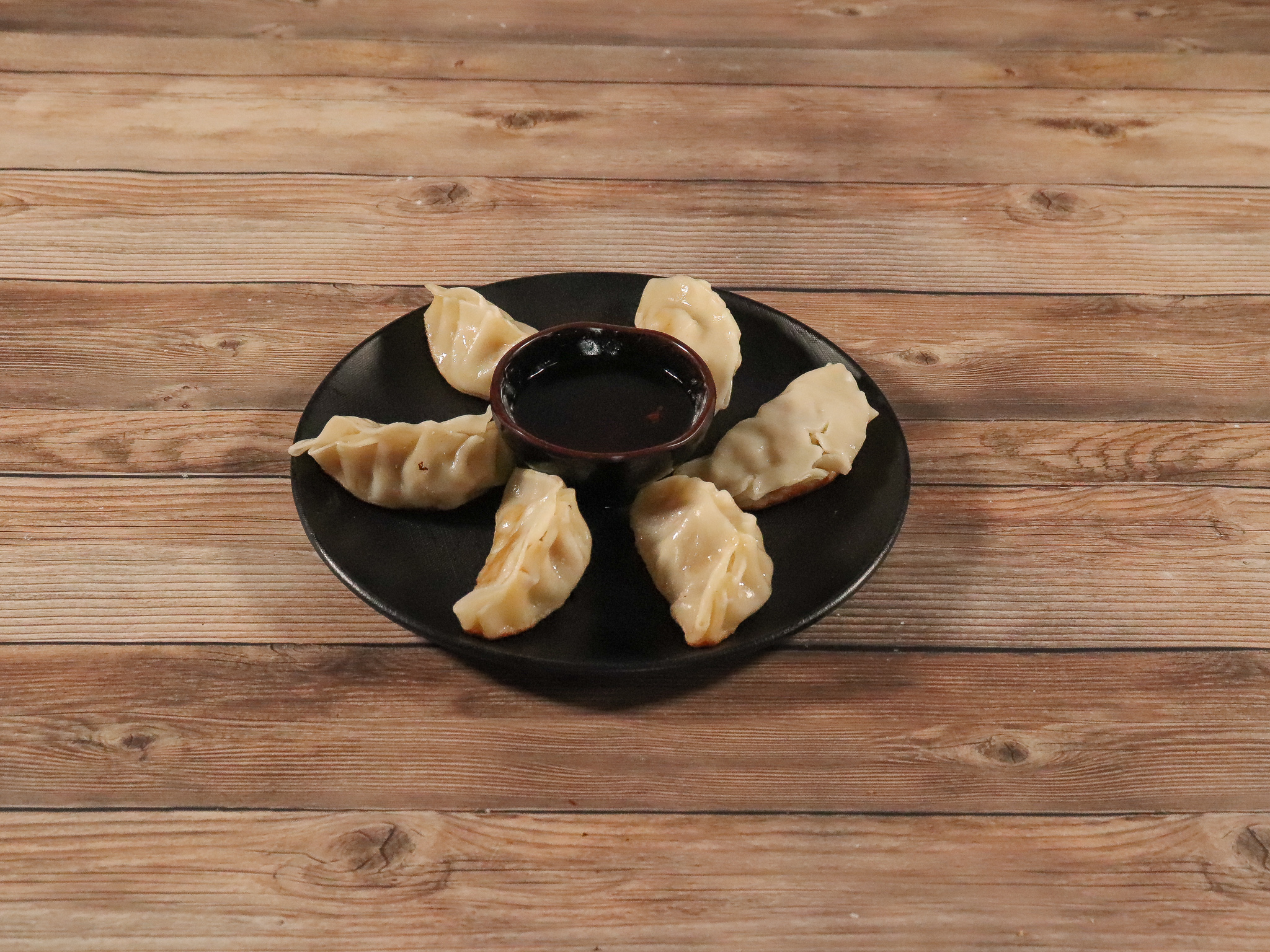 Order A5. Pot Stickers food online from Nam's Noodle store, Madison on bringmethat.com