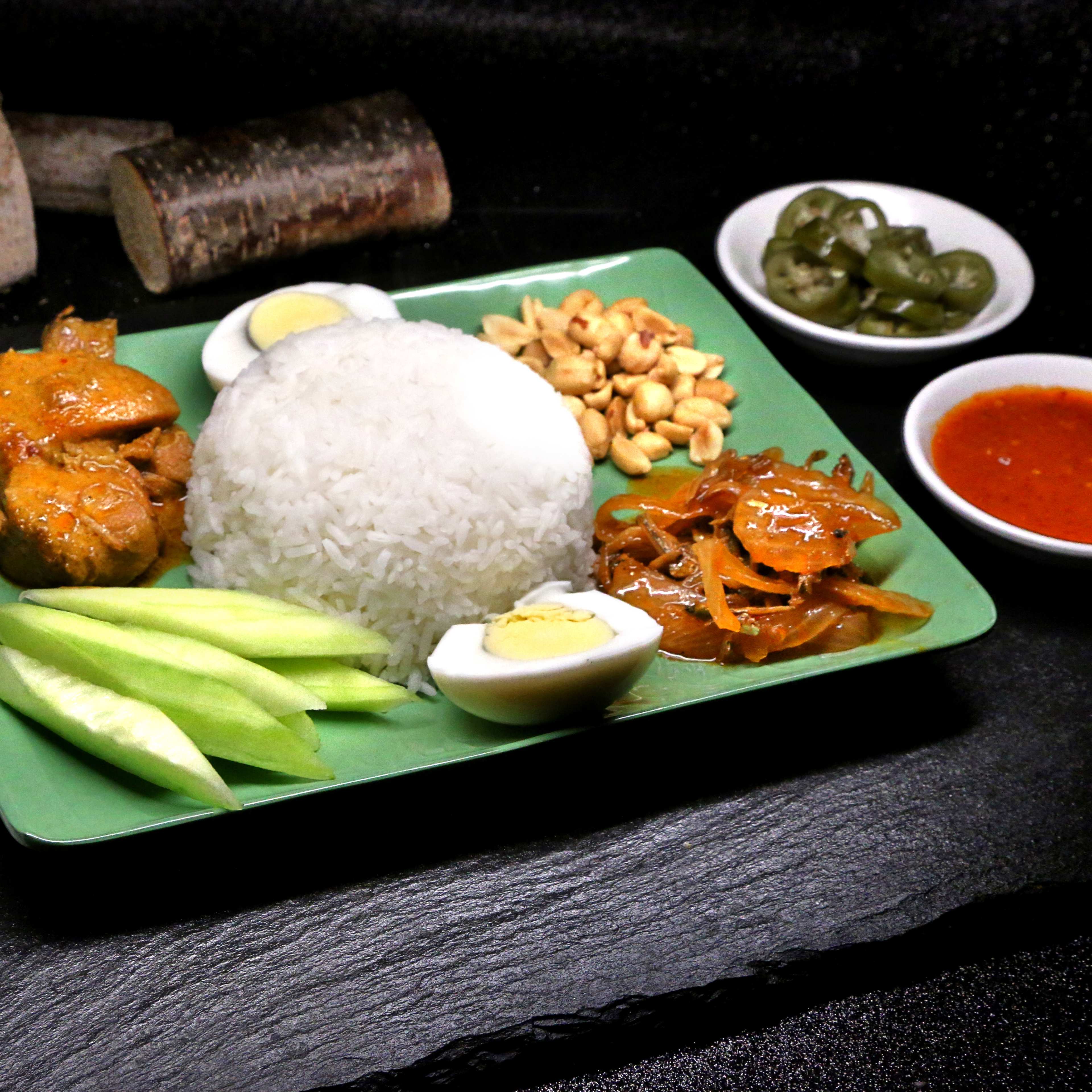 Order F11. Nasi Lemak Rice food online from Singapore Cafe store, Sugar Land on bringmethat.com