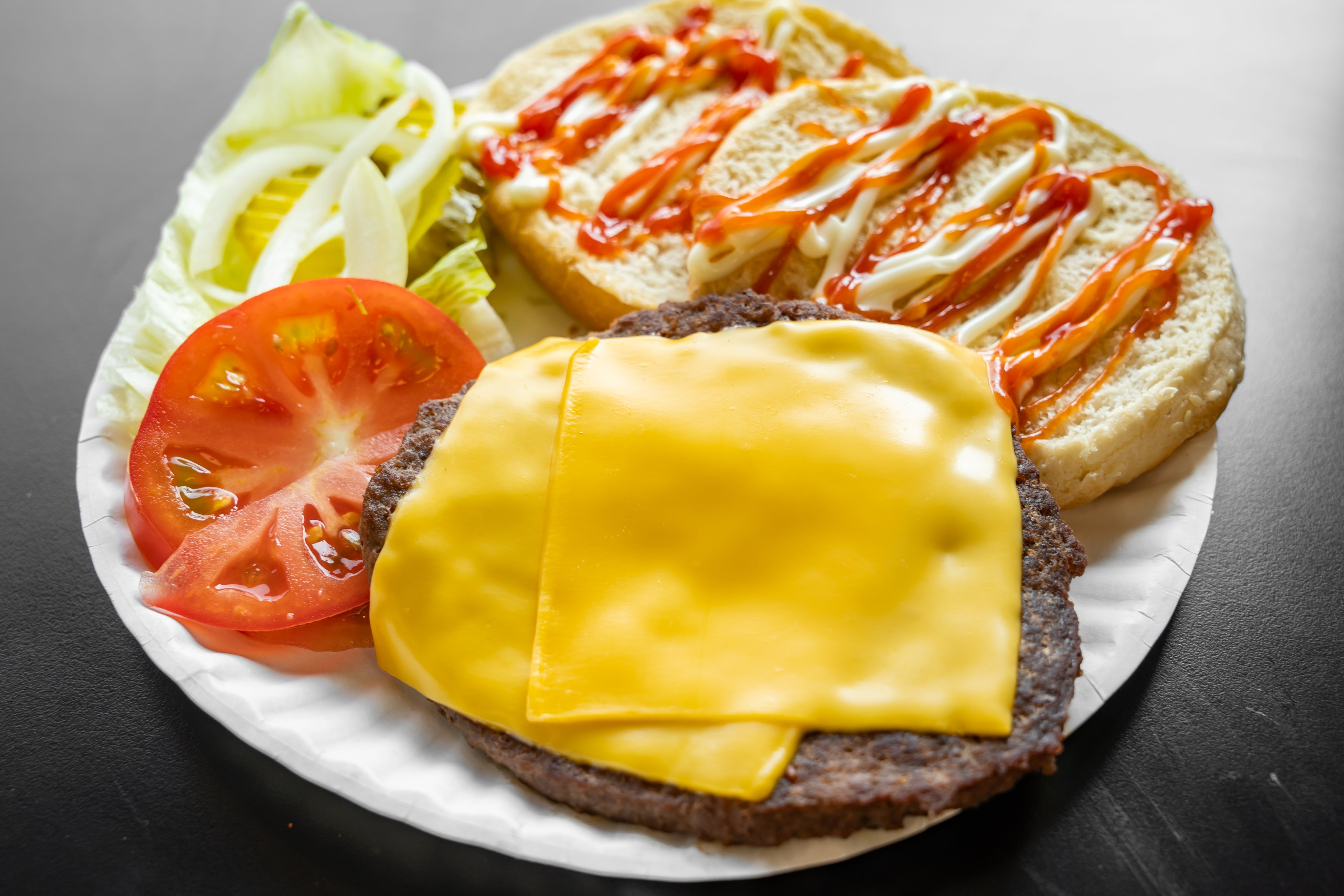 Order Cheeseburger - Burger food online from Linda's Pizza store, Bronx on bringmethat.com