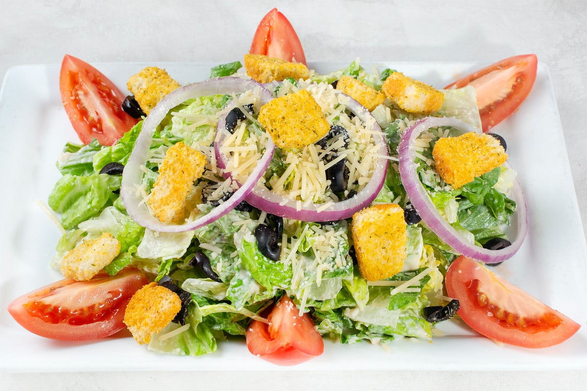 Order CLASSIC CAESAR food online from Johnny Carinos store, Baytown on bringmethat.com