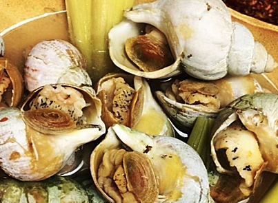 Order SEA SNAILS food online from District One Kitchen & Bar store, Las Vegas on bringmethat.com