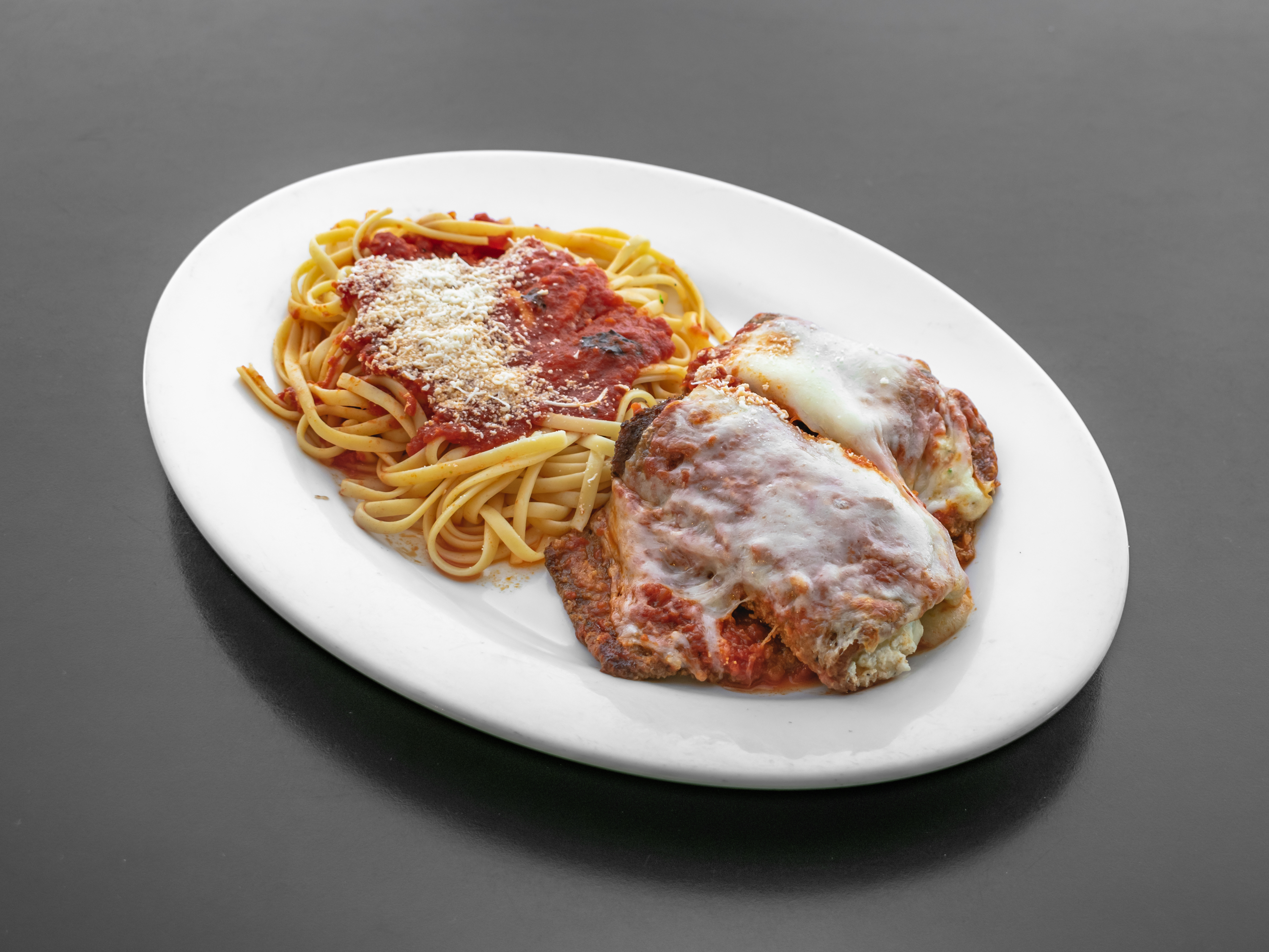 Order Eggplant Rollatini with Pasta  food online from Luigis Famous Pizza Restaurante store, Lincroft on bringmethat.com