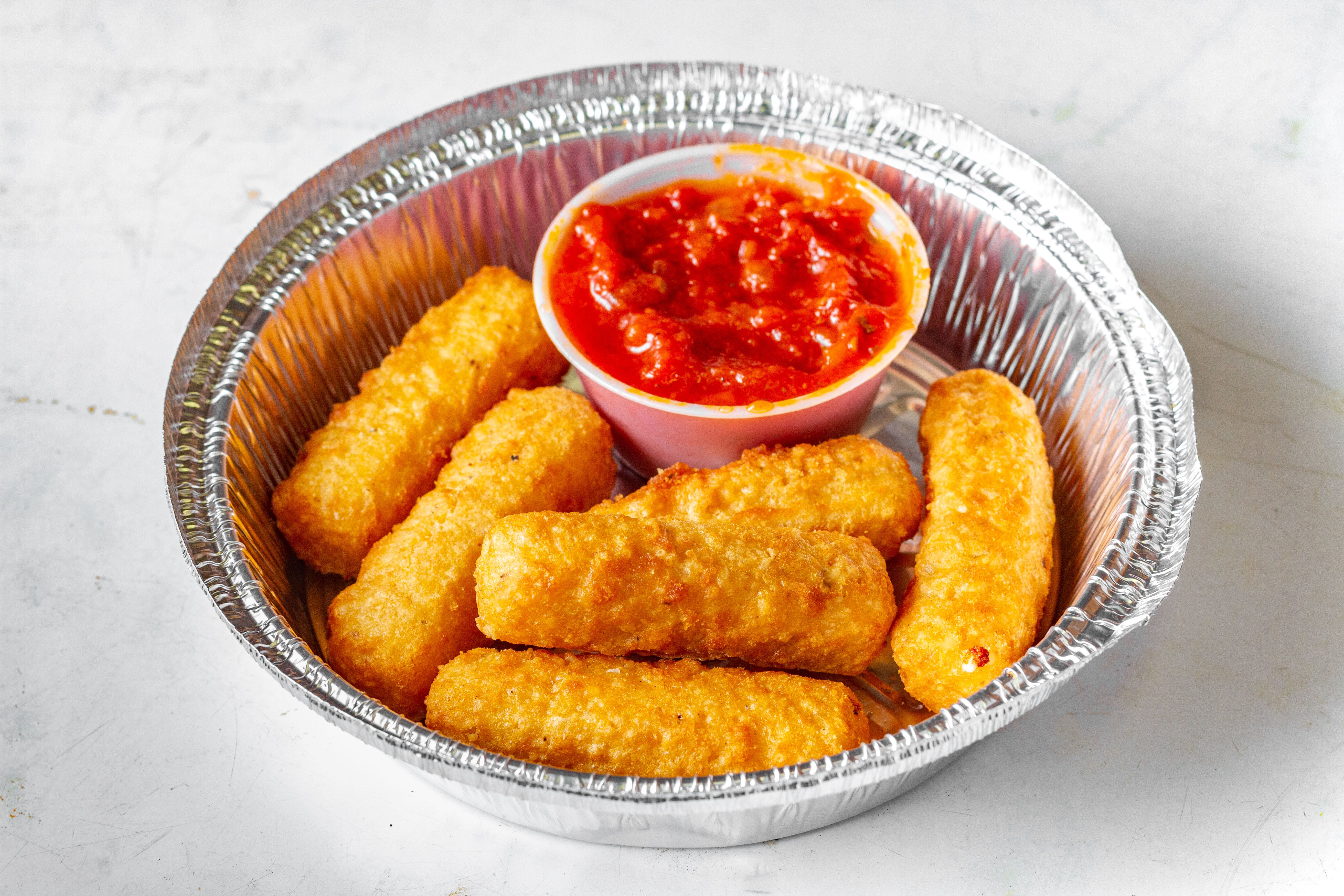 Order Mozzarella Sticks - 6 Pieces food online from Mikie's Pizza & Subs store, Baltimore on bringmethat.com