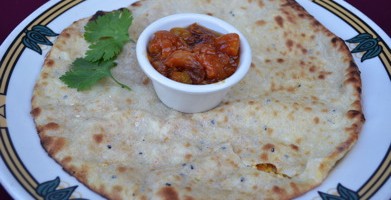 Order Cheese Naan food online from Flavor of India store, Studio City on bringmethat.com