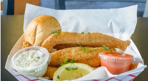 Order Catfish Dinner with fries and dinner roll and cole slaw food online from Surfs Up store, DeKalb on bringmethat.com