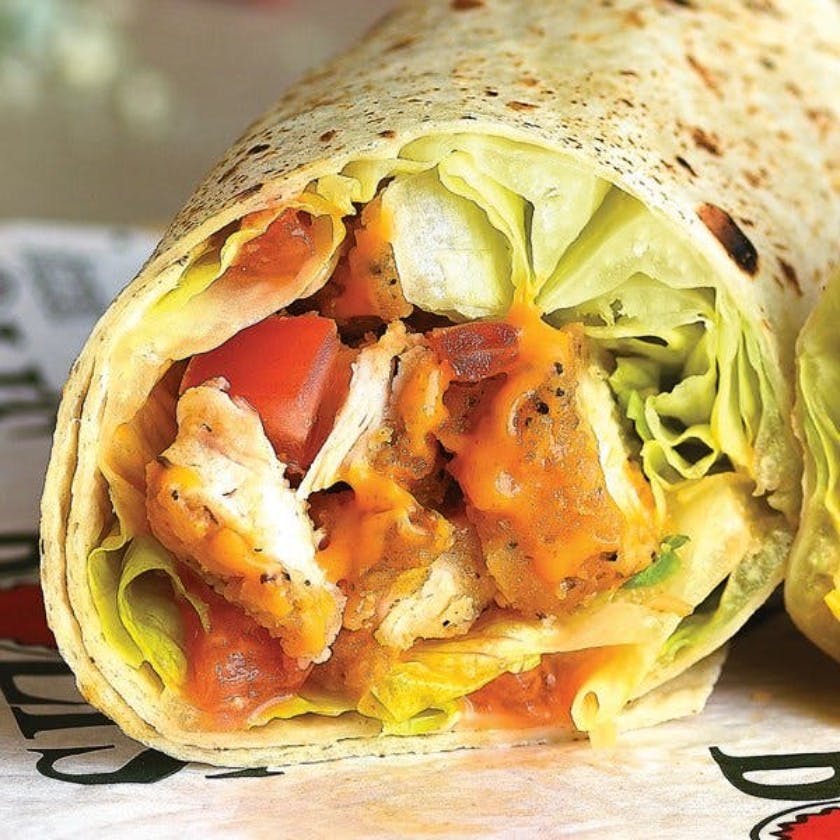 Order Buffalo Crispy Chicken Wrap - Wrap food online from Pizza Boli's store, Baltimore on bringmethat.com