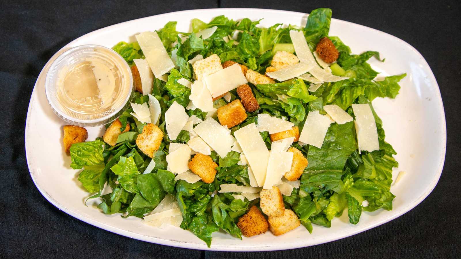 Order Caesar Salad  food online from Capri Express store, Burr Ridge on bringmethat.com