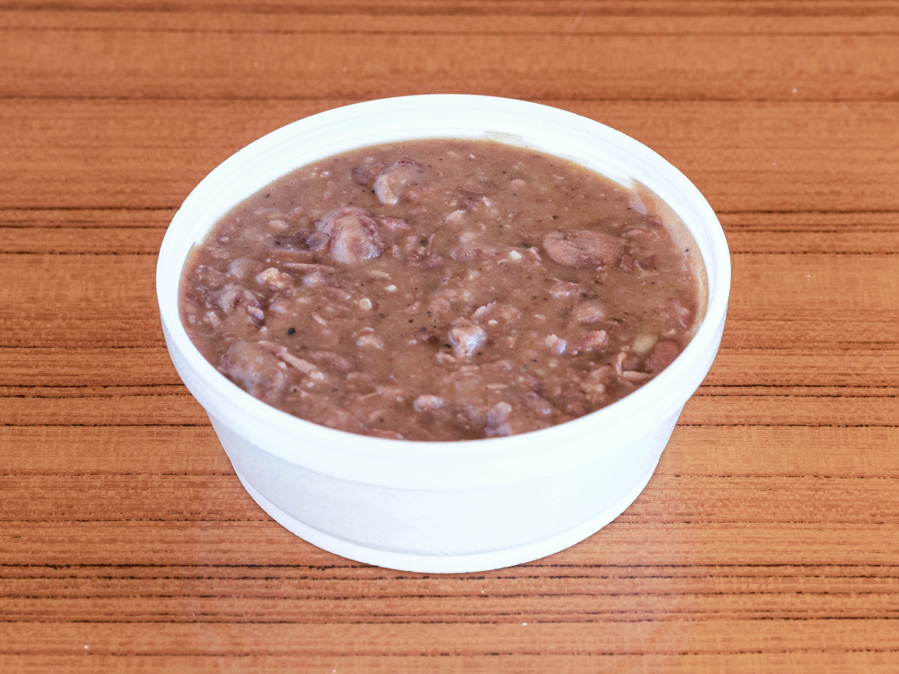 Order Red Beans and Rice  food online from Whodaq Daiquiris store, Keller on bringmethat.com