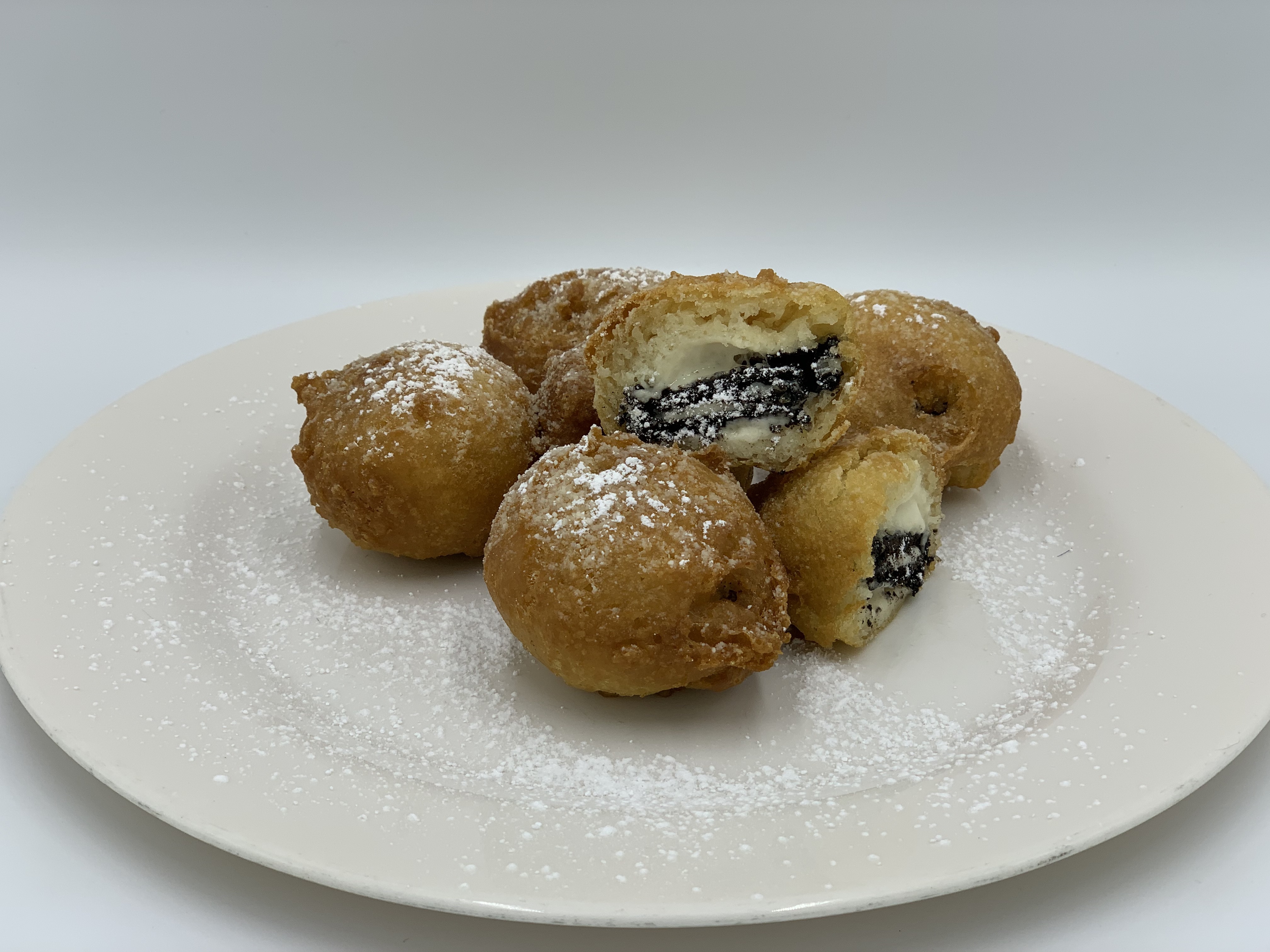Order Fried Oreos food online from Mario's Pizzeria of Seaford store, Seaford on bringmethat.com
